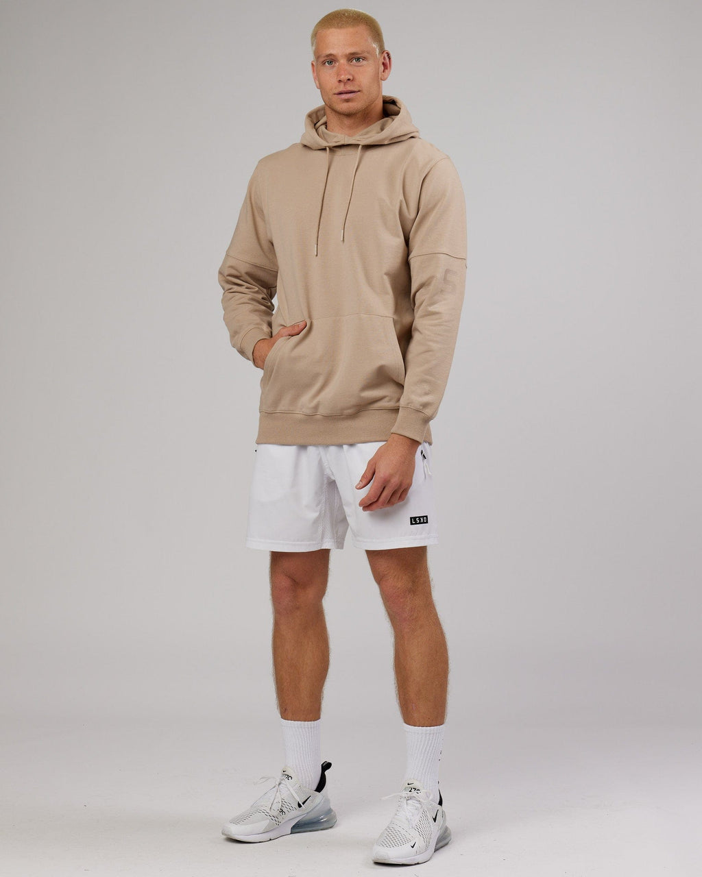 Model wearing Perimeter FLXFleece Hoodie - Taupe