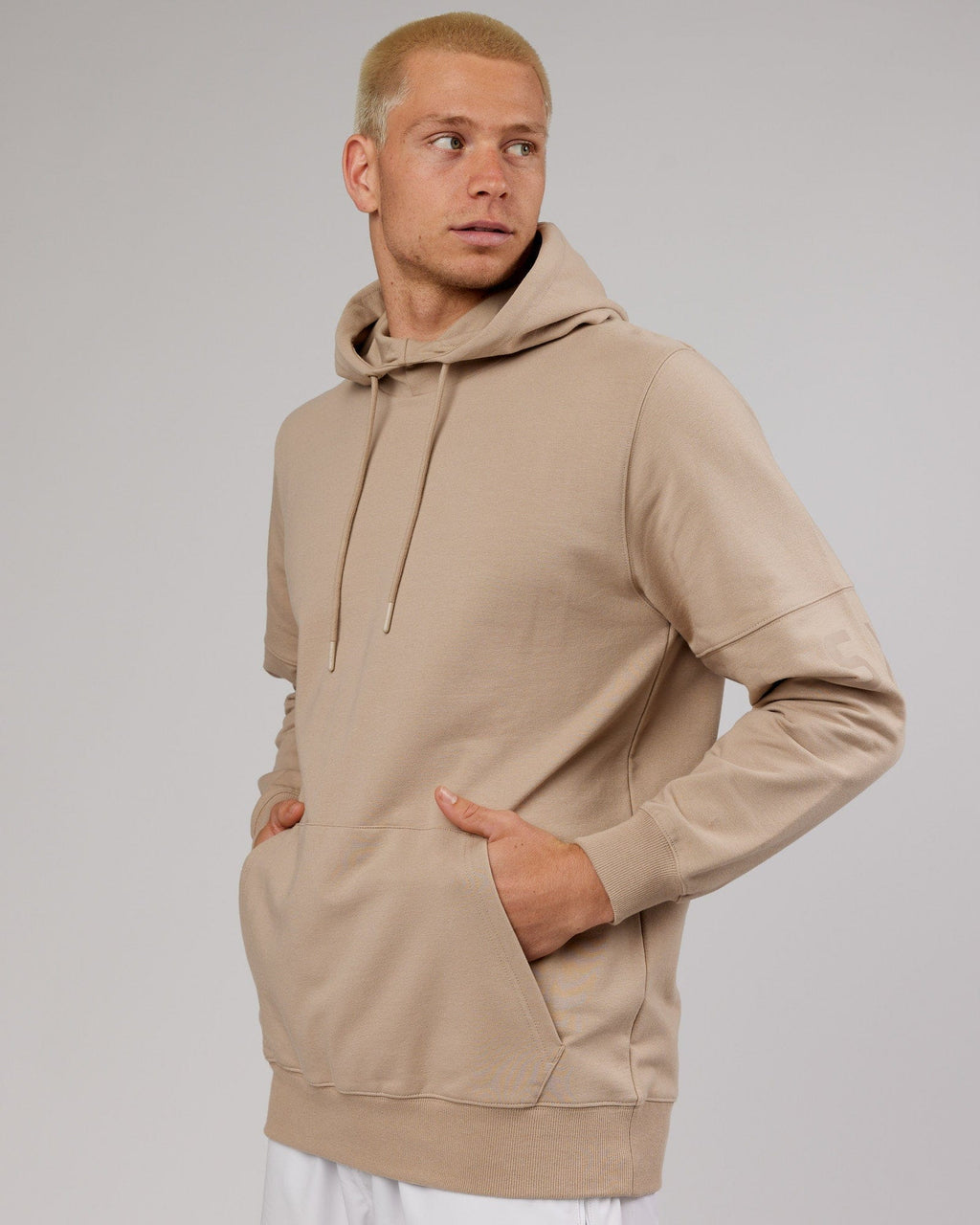 Model wearing Perimeter FLXFleece Hoodie - Taupe