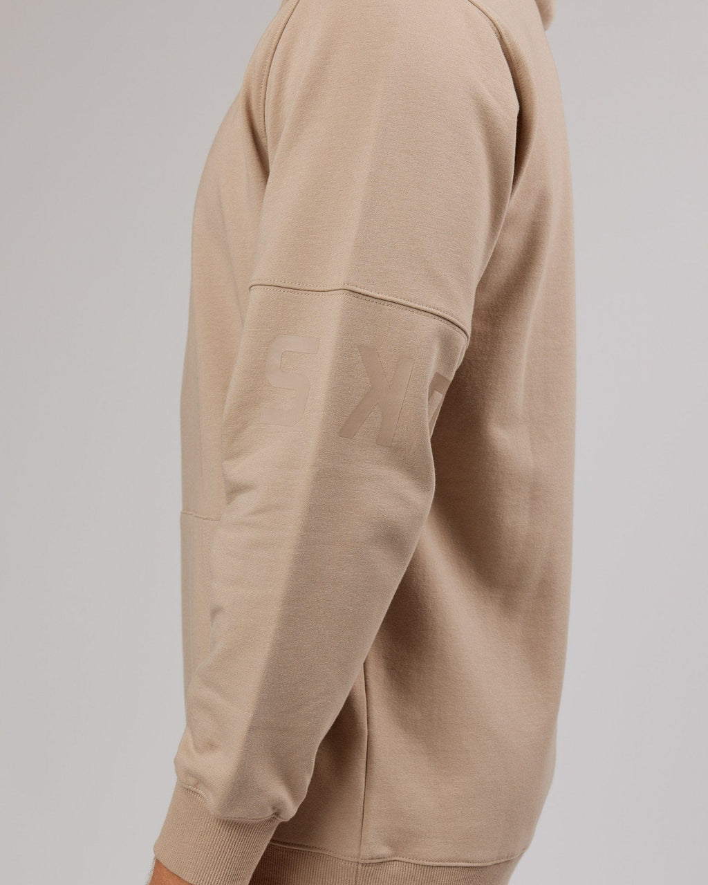 Model wearing Perimeter FLXFleece Hoodie - Taupe
