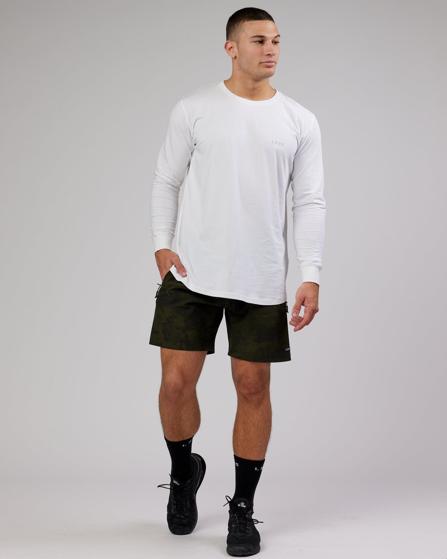 Model wearing Deluxe PimaFLX LS Tee - White