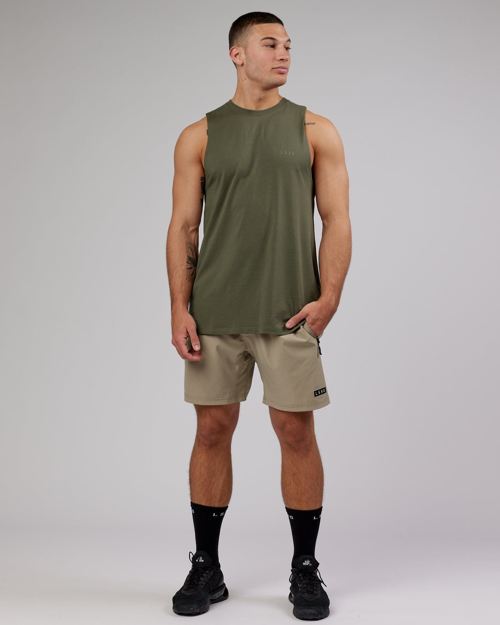 Model wearing Deluxe PimaFLX Tank - Olive Fade