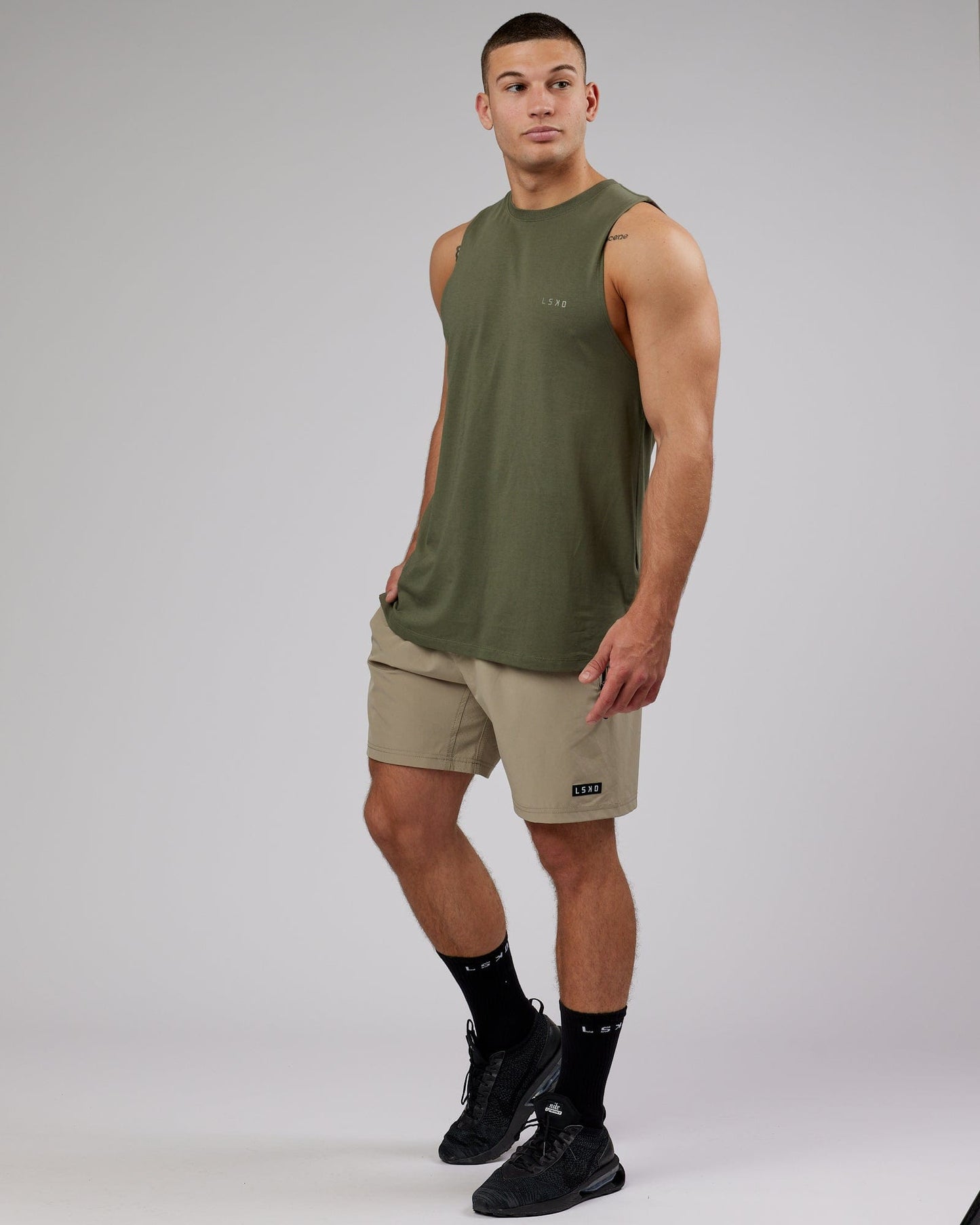 Model wearing Deluxe PimaFLX Tank - Olive Fade
