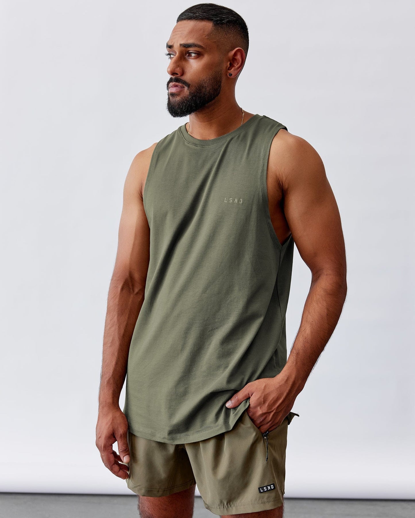 Model wearing Deluxe PimaFLX Tank - Olive Fade