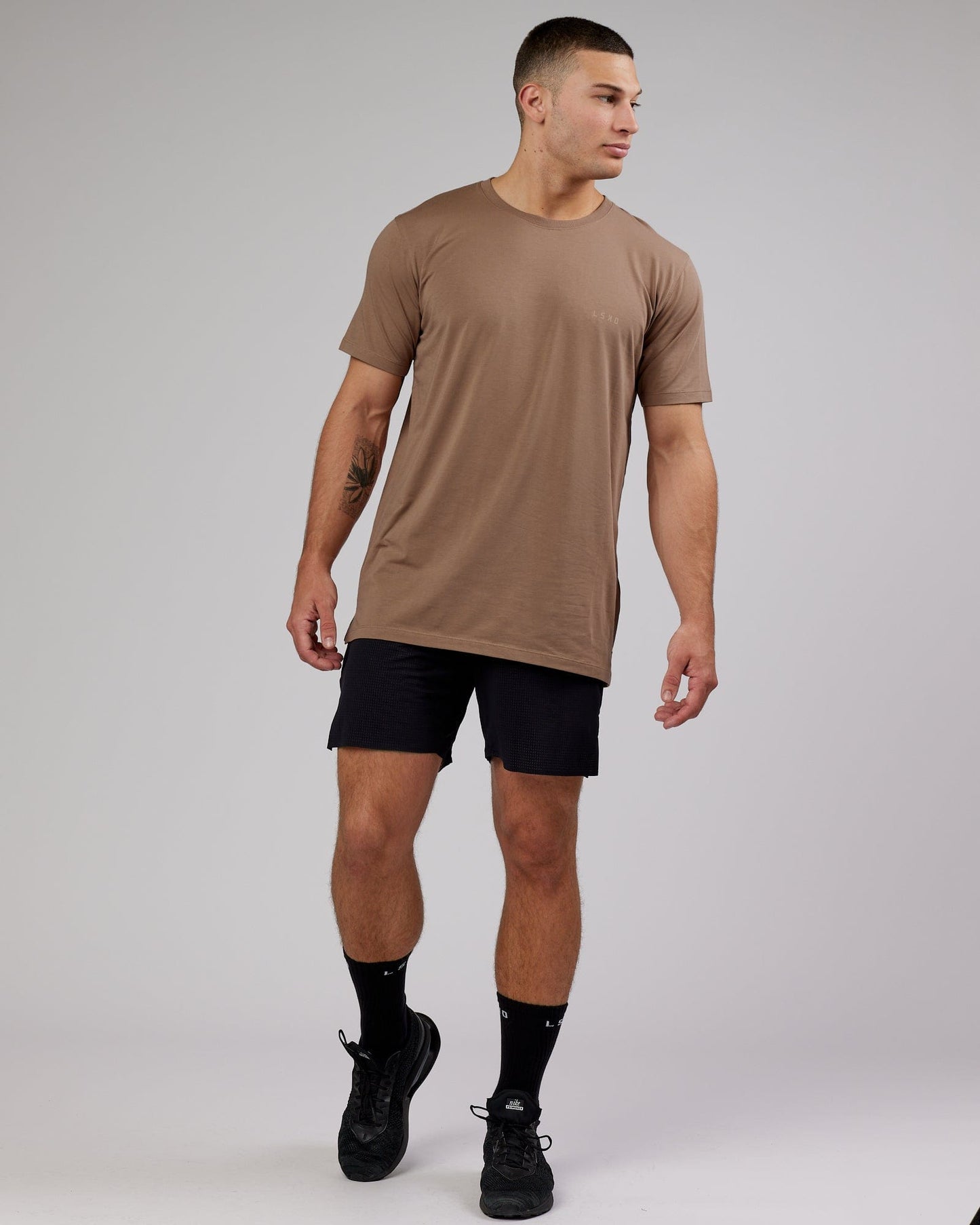 Model wearing Deluxe PimaFLX Tee - Fossil