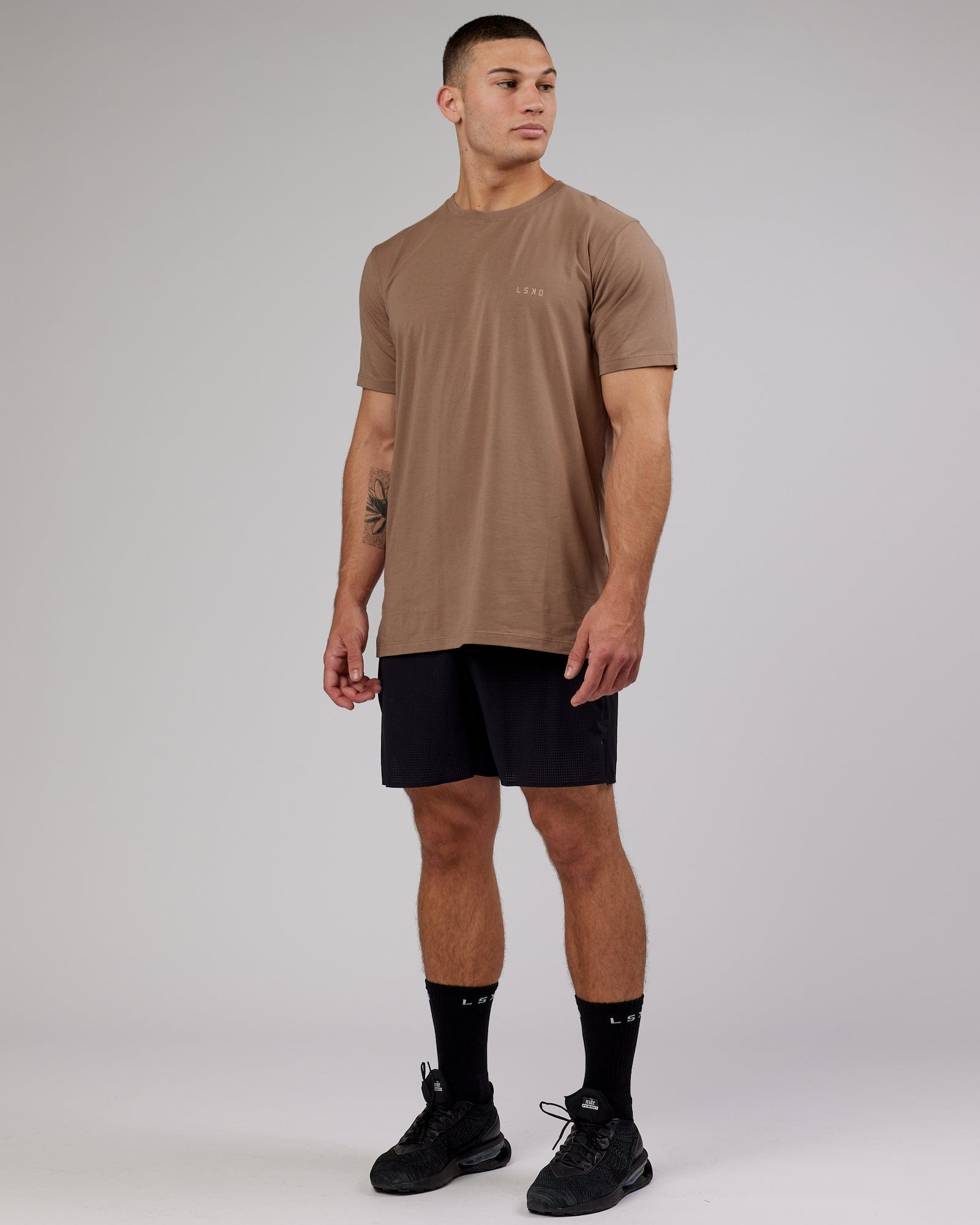 Model wearing Deluxe PimaFLX Tee - Fossil