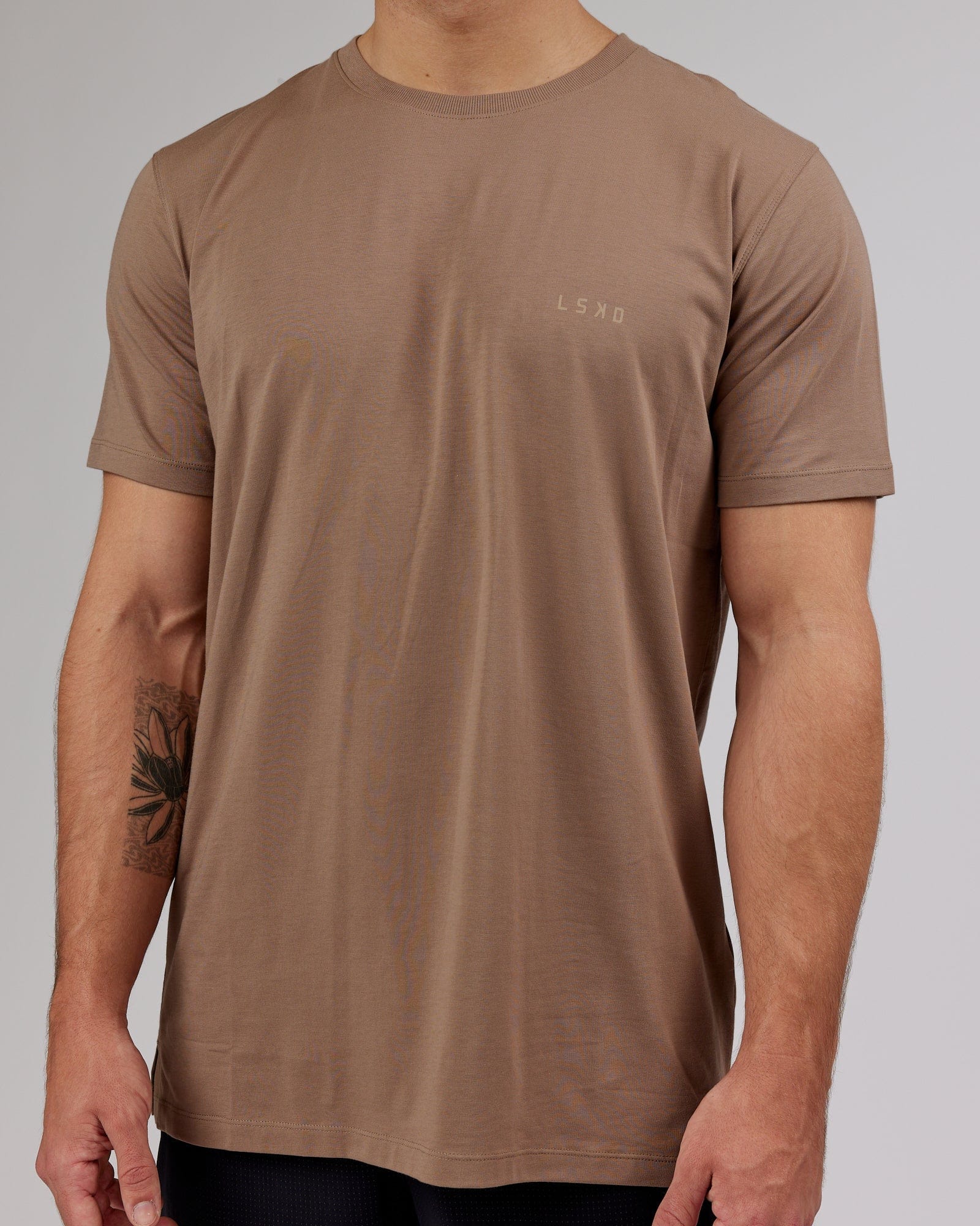 Model wearing Deluxe PimaFLX Tee - Fossil