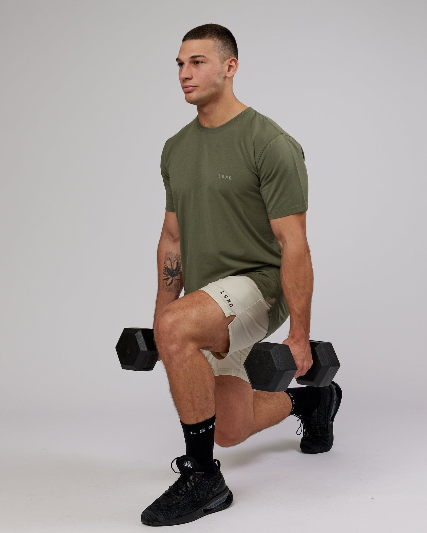 Model wearing Deluxe PimaFLX Tee - Olive Fade