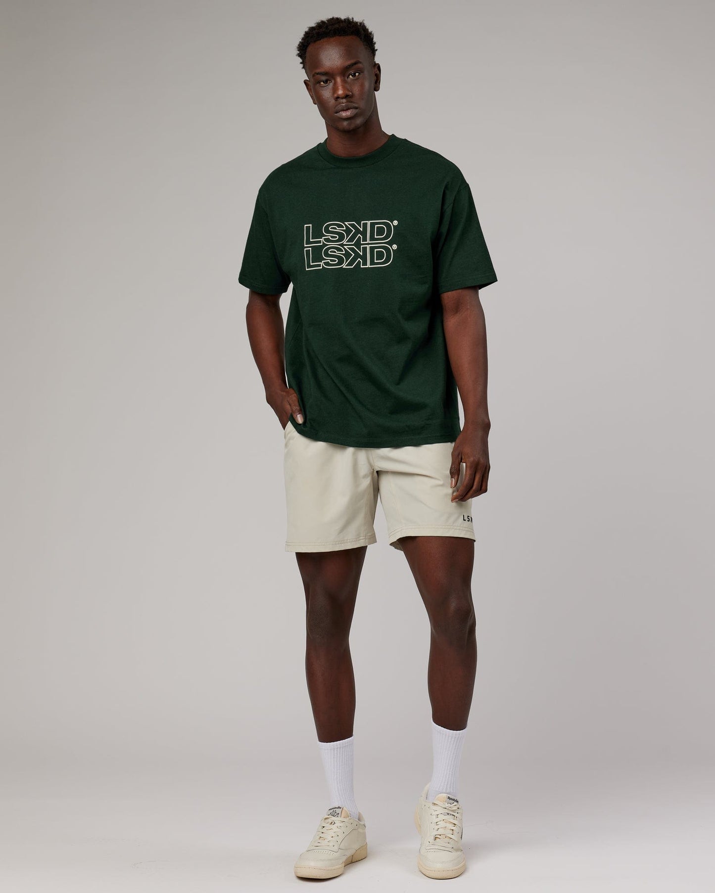 Model wearing Stacks Up Heavyweight Oversize Tee - Forest