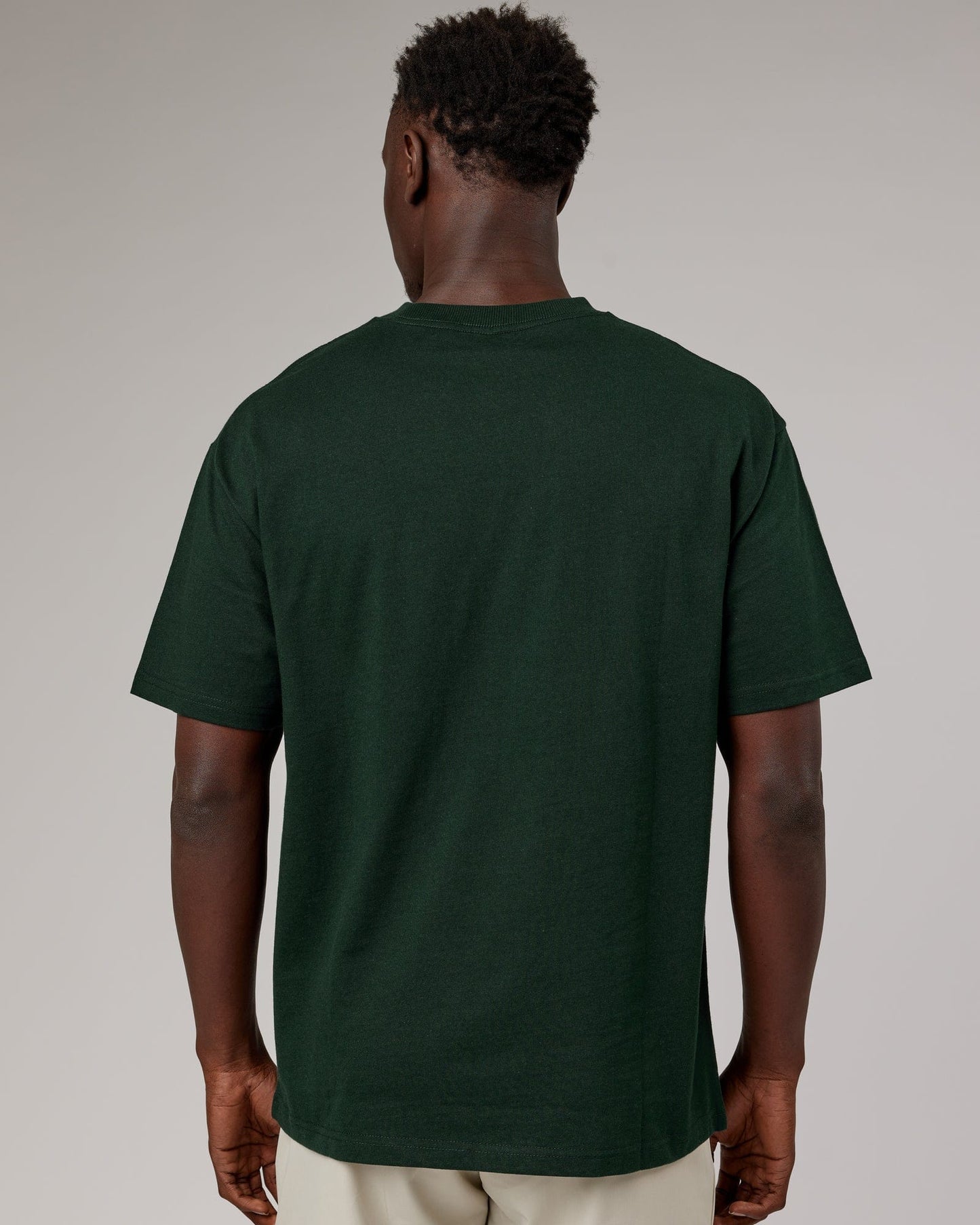 Model wearing Stacks Up Heavyweight Oversize Tee - Forest