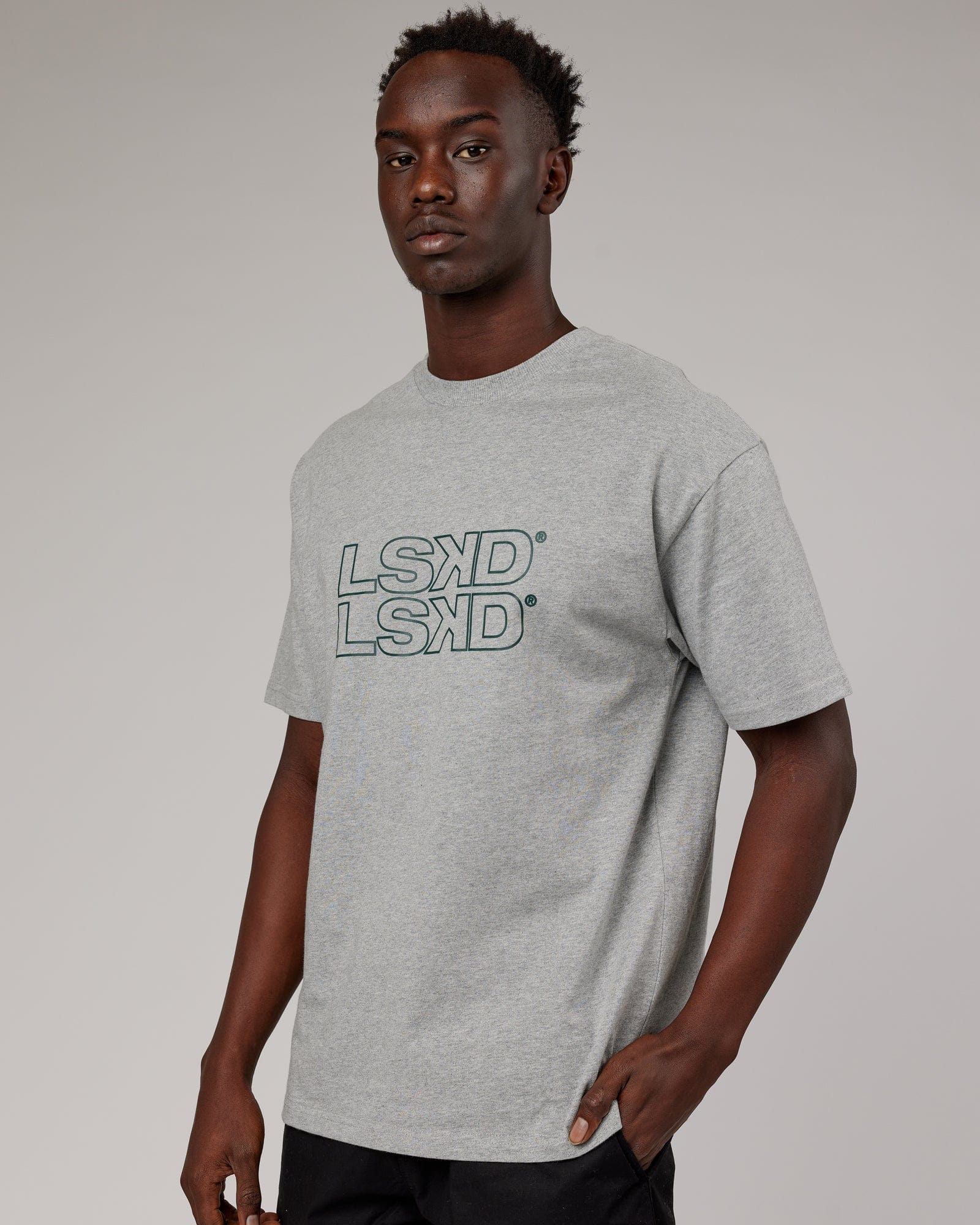 Model wearing Stacks Up Heavyweight Oversize Tee - Lt Grey Marl