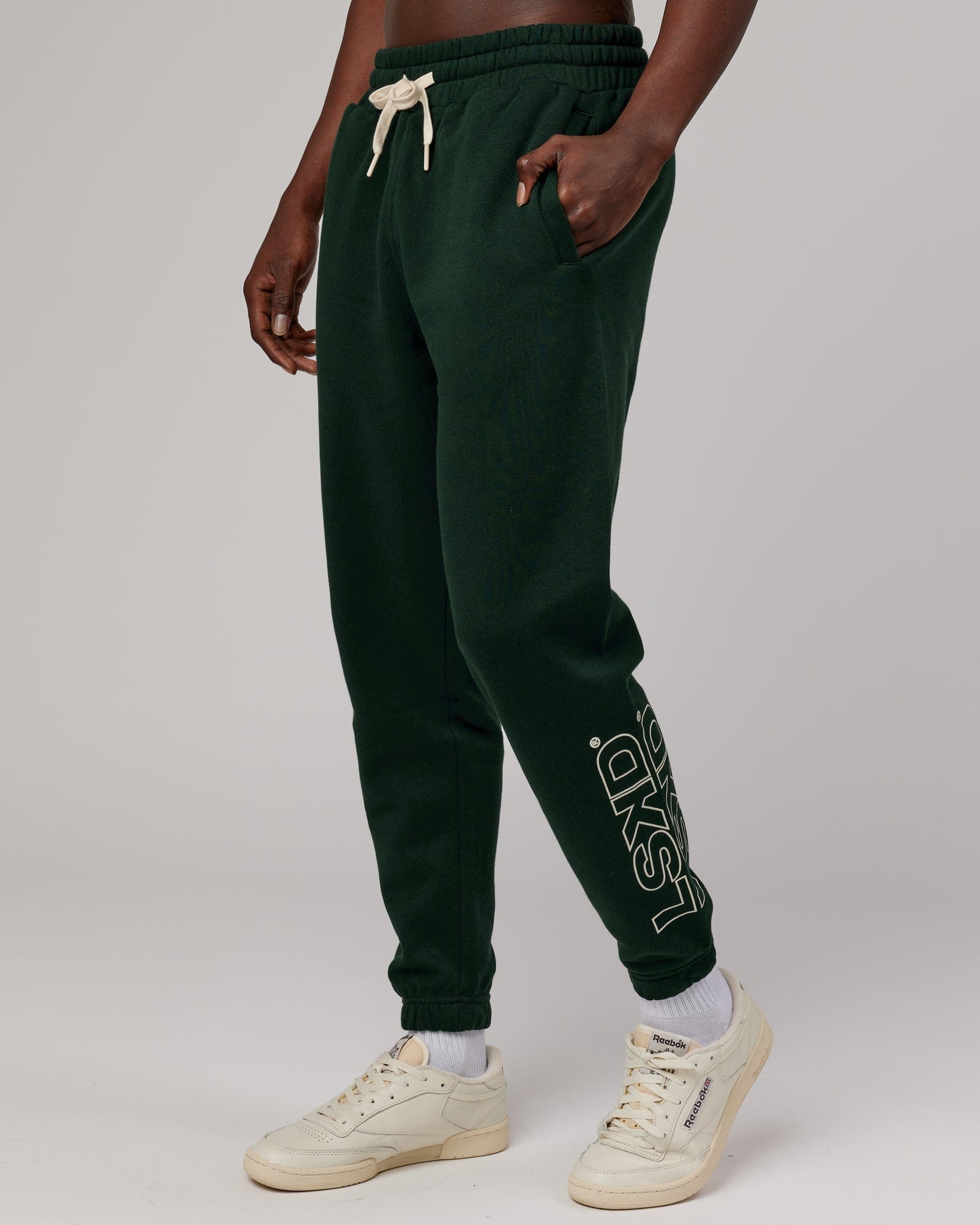 Model wearing Stacks Up Track Pant - Forest
