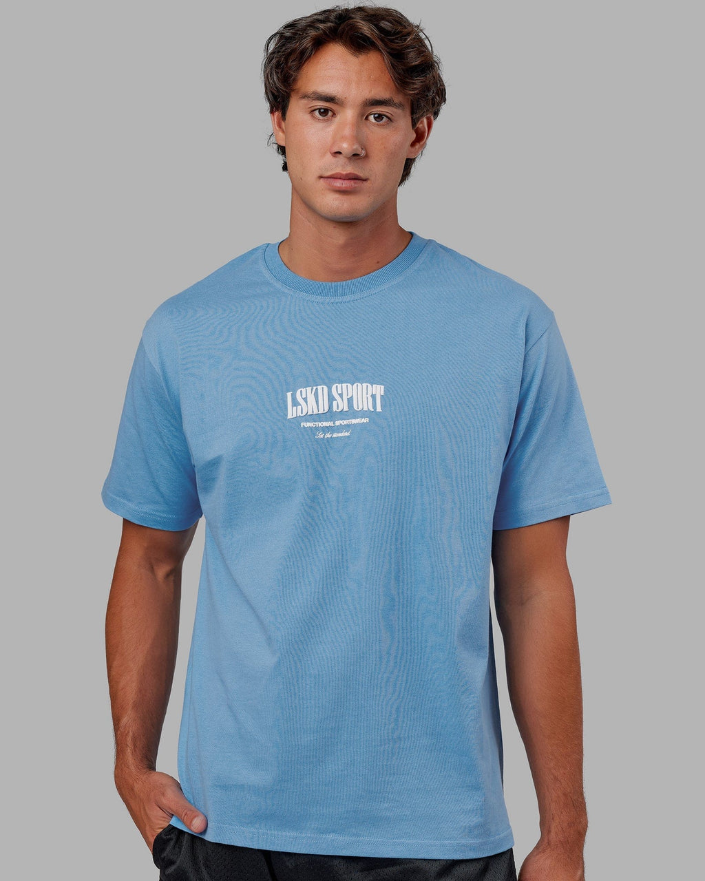 Model wearing Standard Heavyweight Tee Oversize - Azure Blue