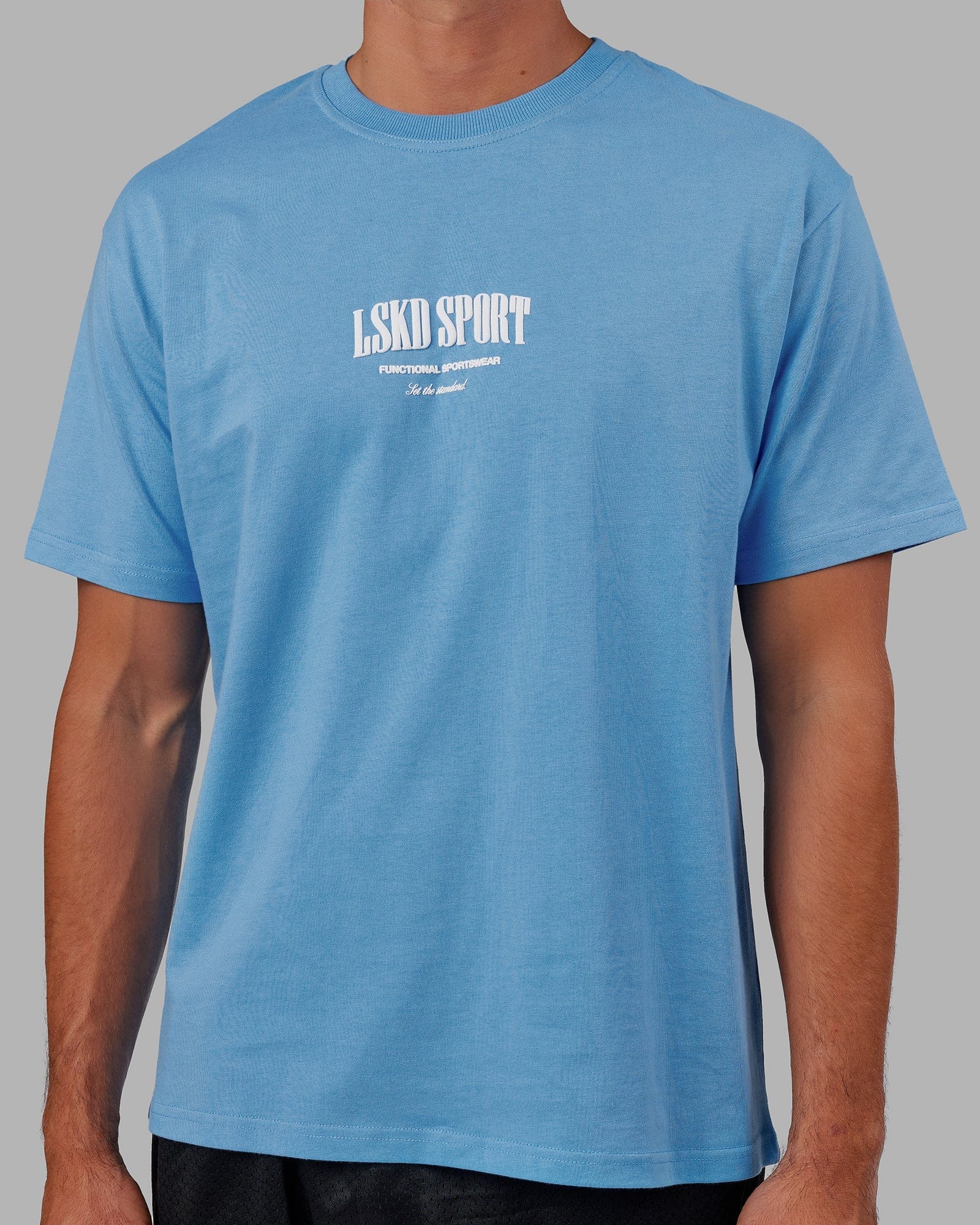 Model wearing Standard Heavyweight Tee Oversize - Azure Blue