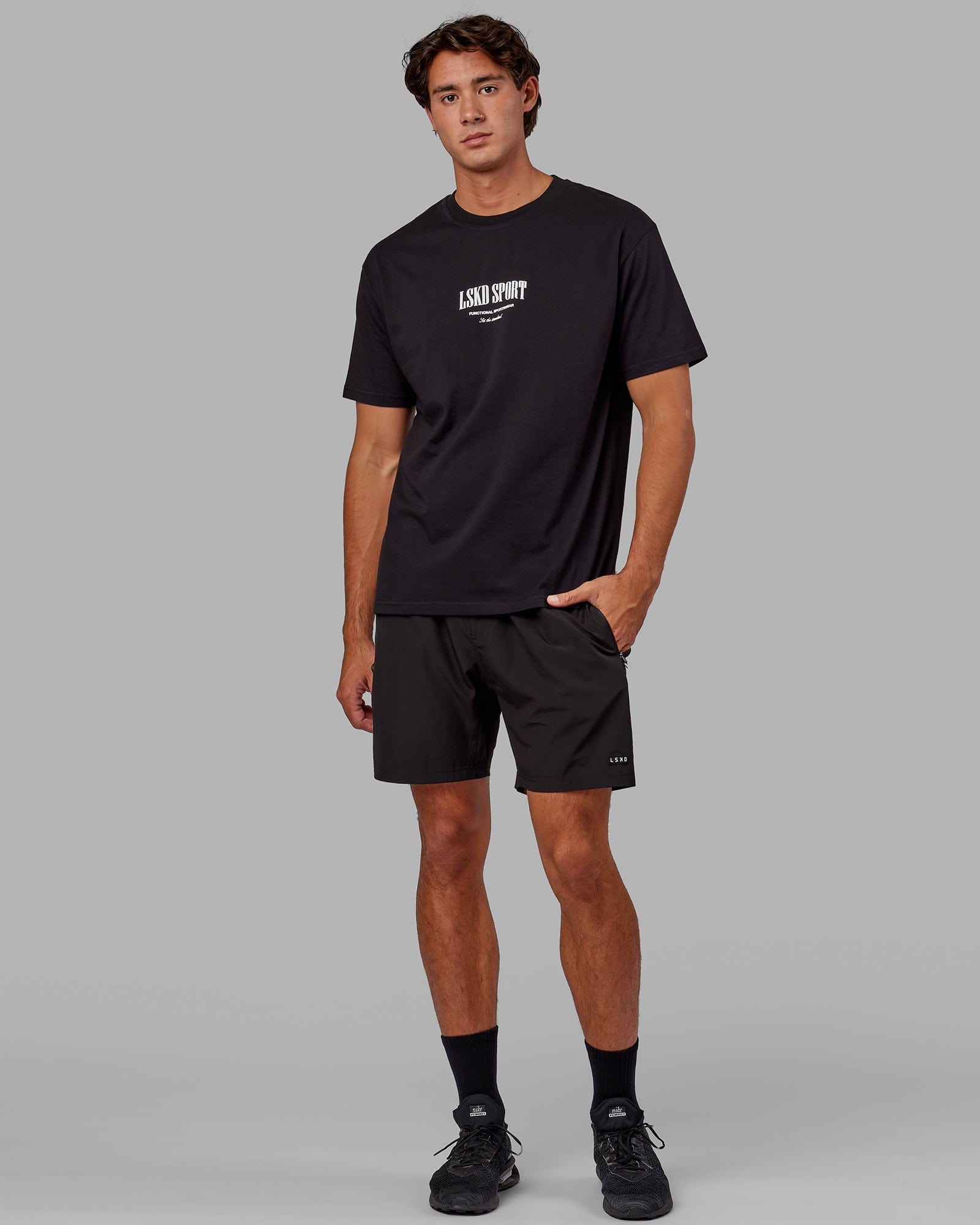 Model wearing Standard Heavyweight Tee Oversize - Black-White