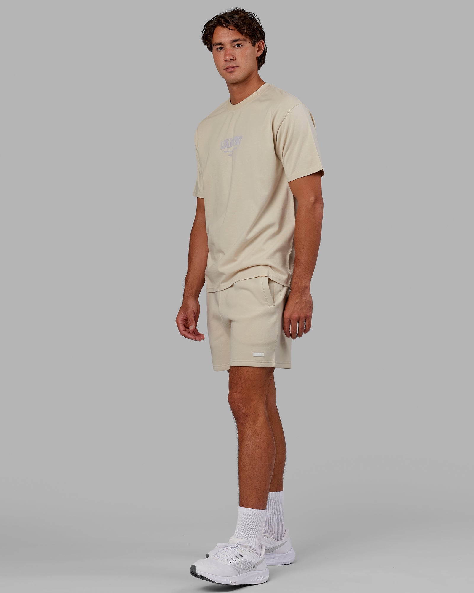 Model wearing Standard Heavyweight Tee Oversize - Bone