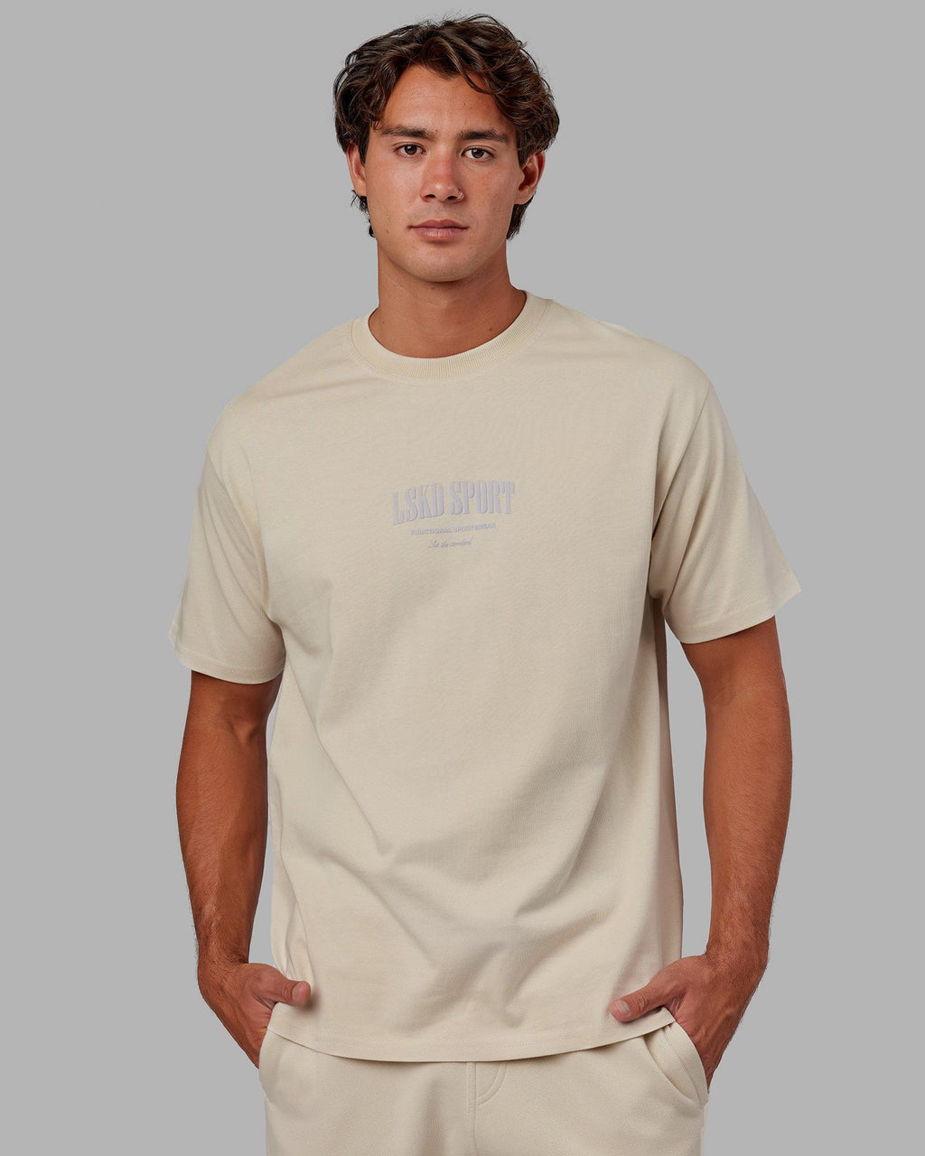 Model wearing Standard Heavyweight Tee Oversize - Bone