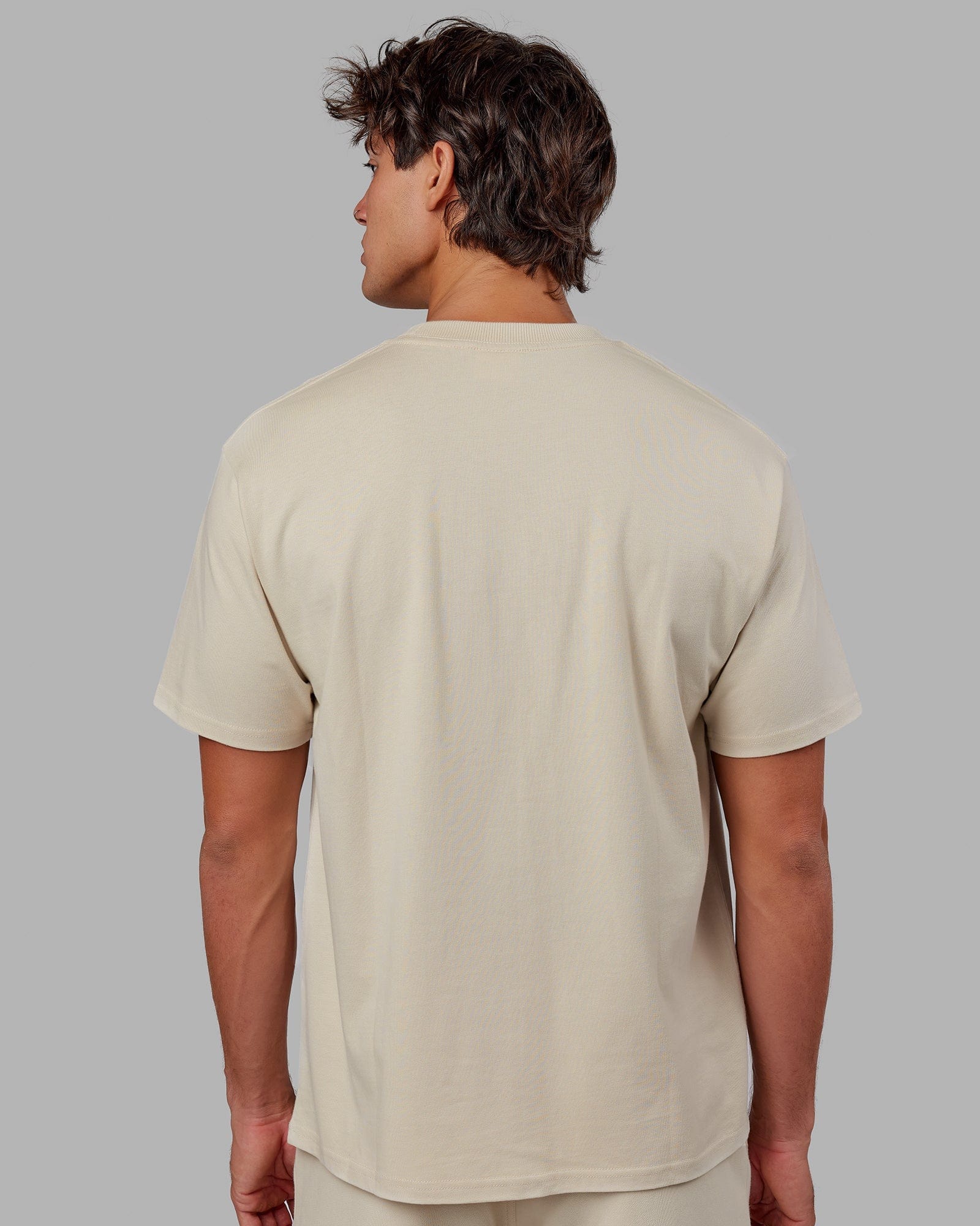 Model wearing Standard Heavyweight Tee Oversize - Bone