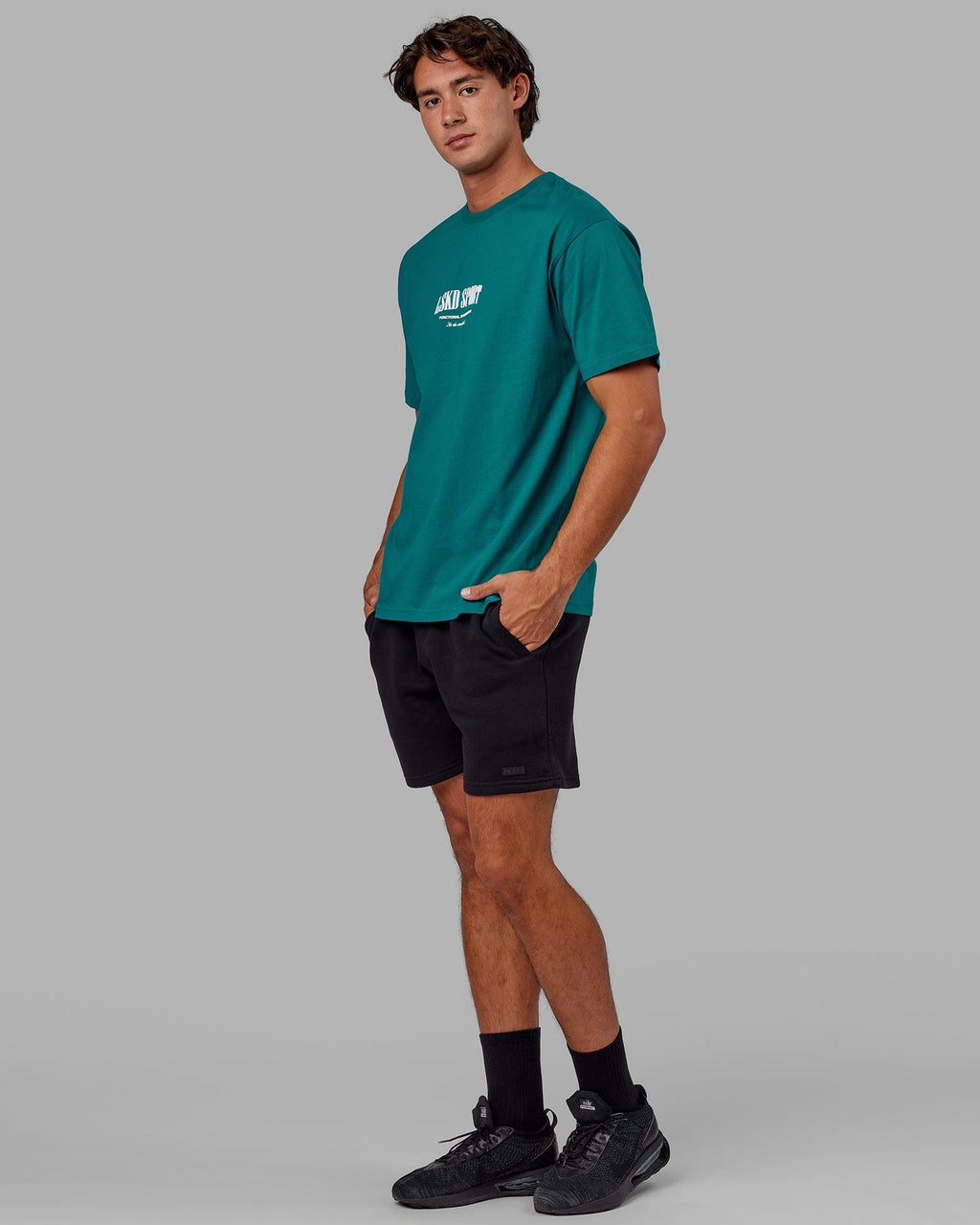 Model wearing Standard Heavyweight Tee Oversize - Deep Lake