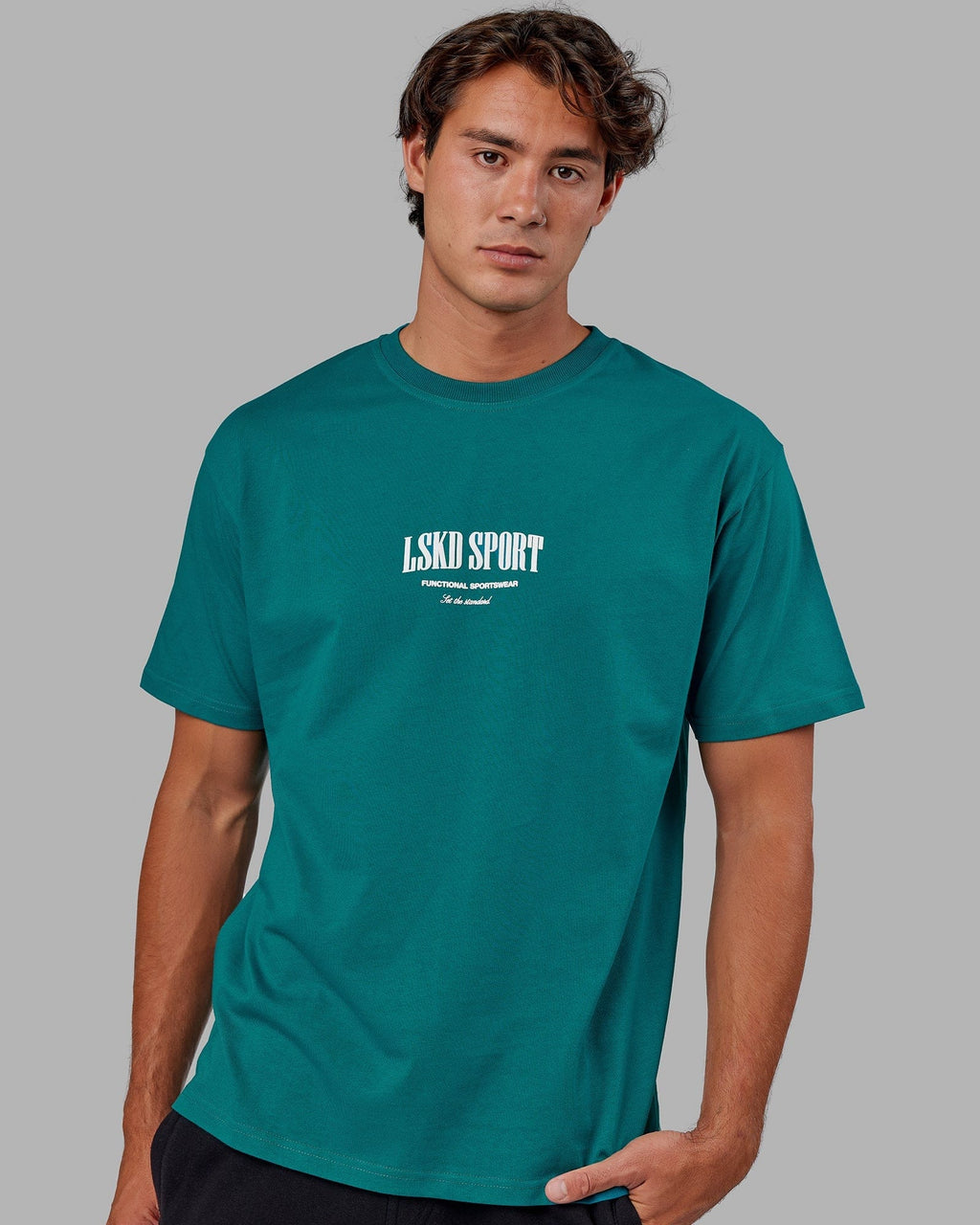 Model wearing Standard Heavyweight Tee Oversize - Deep Lake