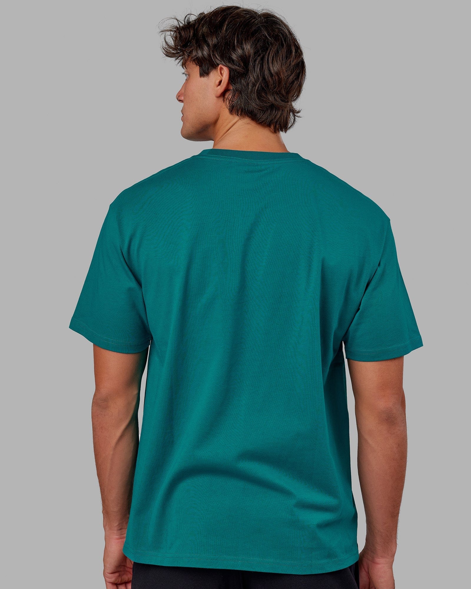 Model wearing Standard Heavyweight Tee Oversize - Deep Lake