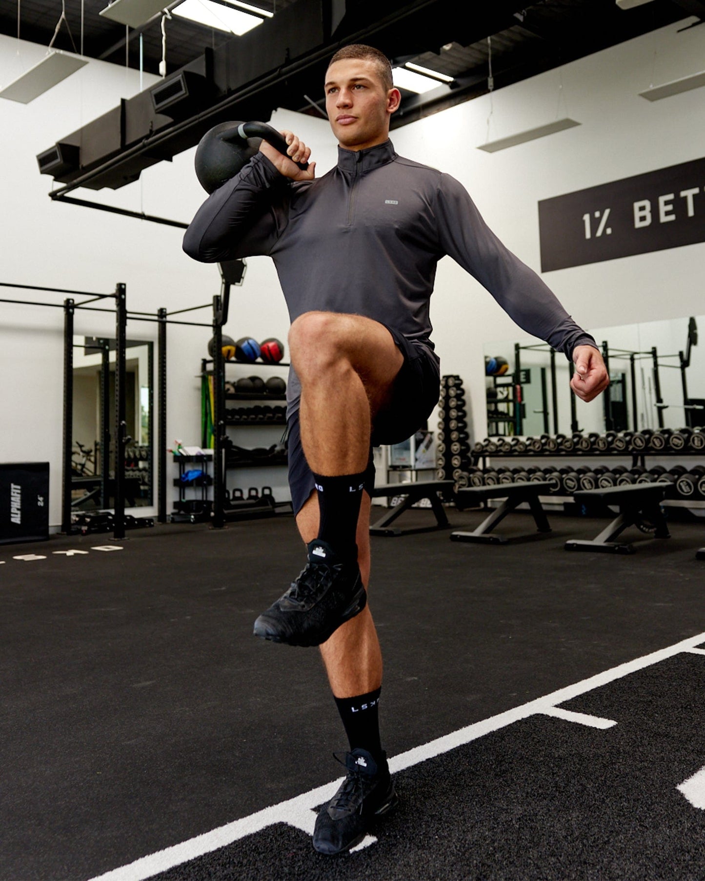 Model wearing Streamlined 1/4 Zip Active LS Top - Asphalt