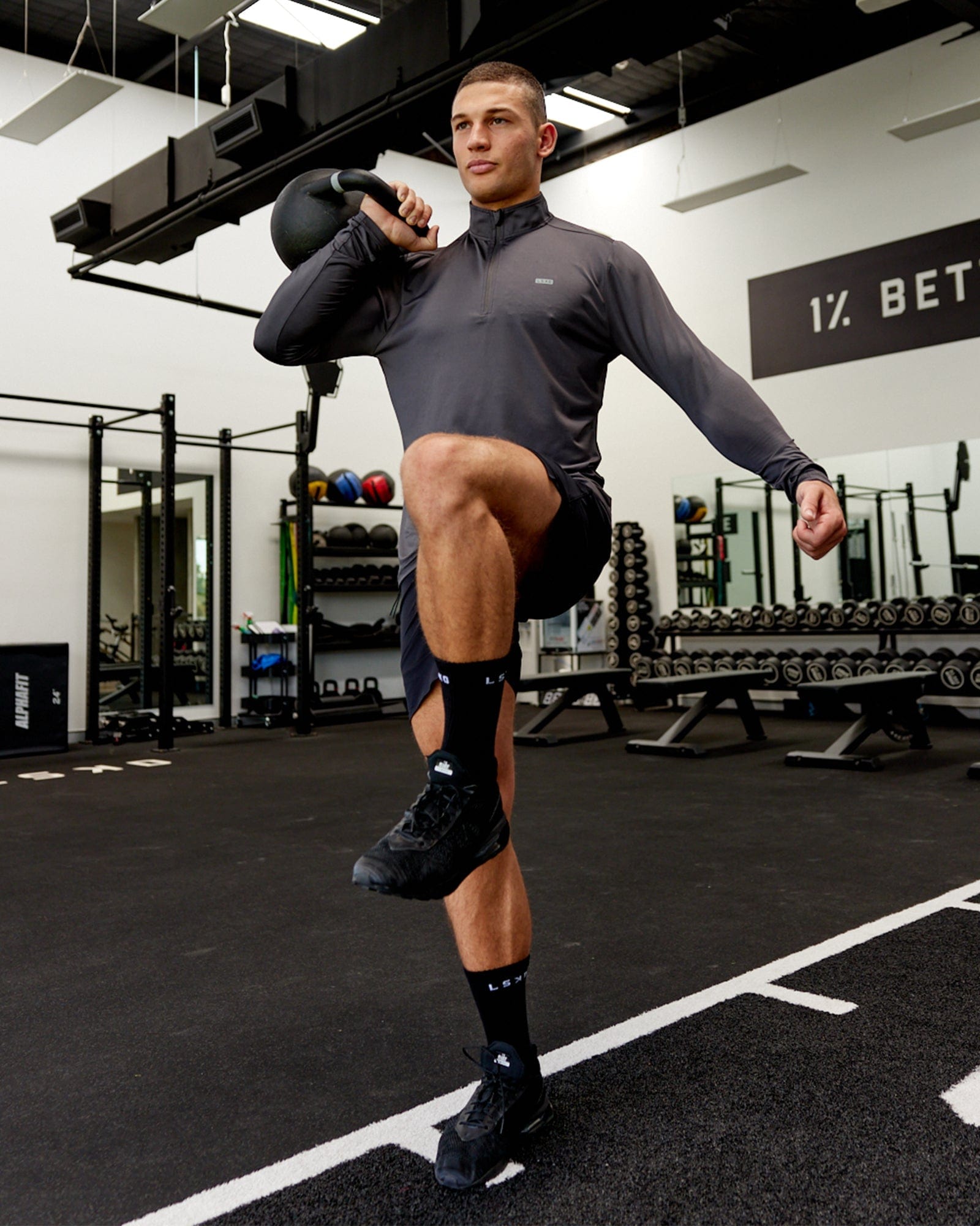 Model wearing Streamlined 1/4 Zip Active LS Top - Asphalt