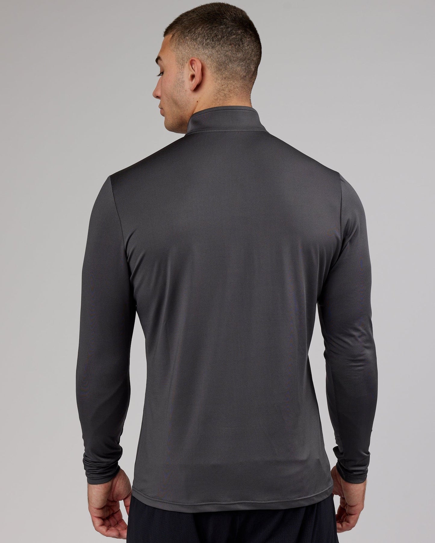 Model wearing Streamlined 1/4 Zip Active LS Top - Asphalt