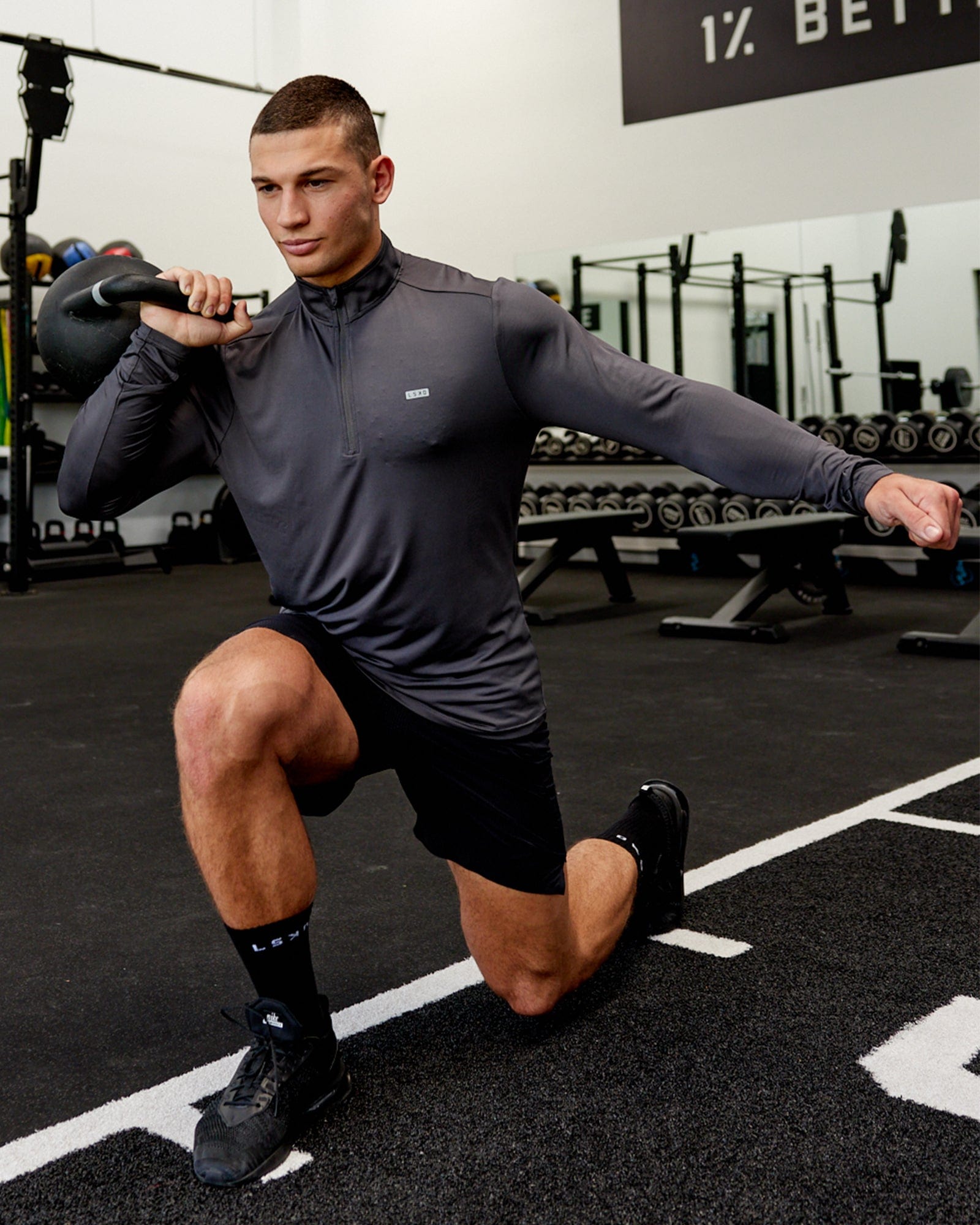 Model wearing Streamlined 1/4 Zip Active LS Top - Asphalt