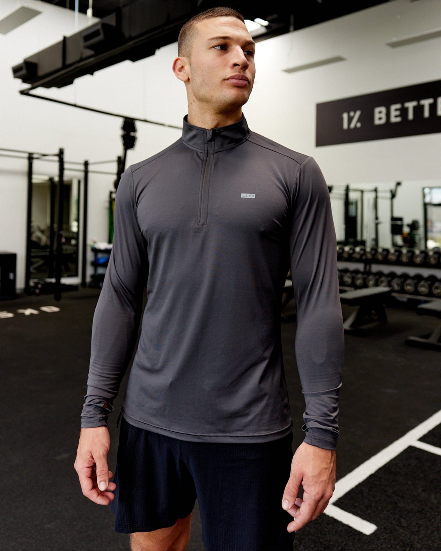 Model wearing Streamlined 1/4 Zip Active LS Top - Asphalt