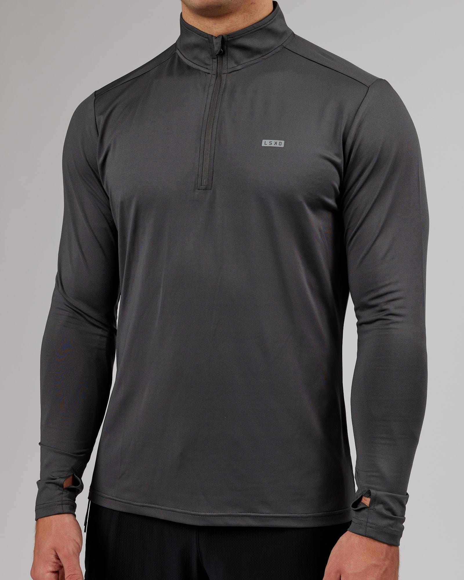 Model wearing Streamlined 1/4 Zip Active LS Top - Asphalt