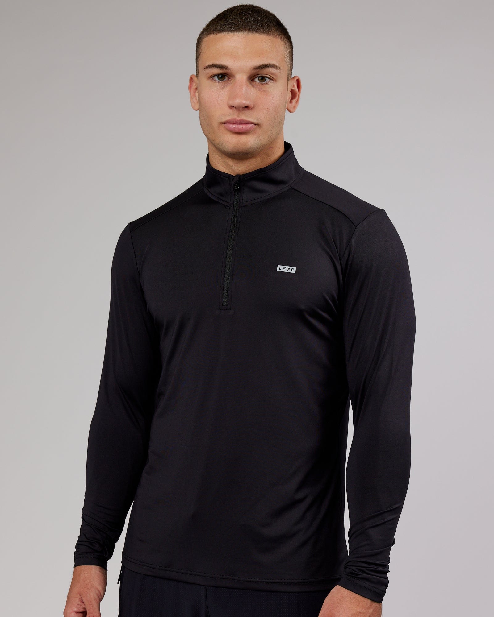Model wearing Streamlined 1/4 Zip Active LS Top - Black