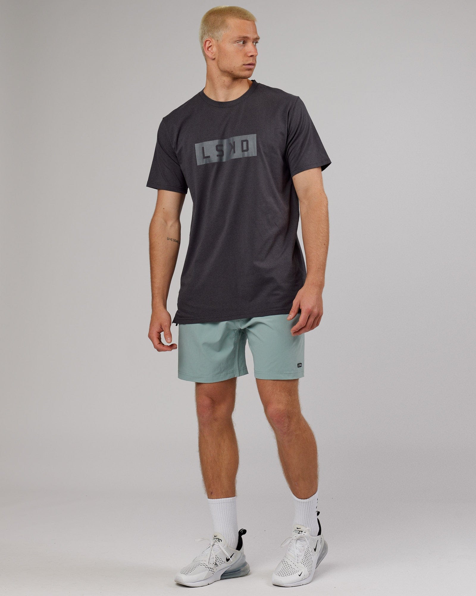 Model wearing Strength FLXDRY Performance Tee - Asphalt