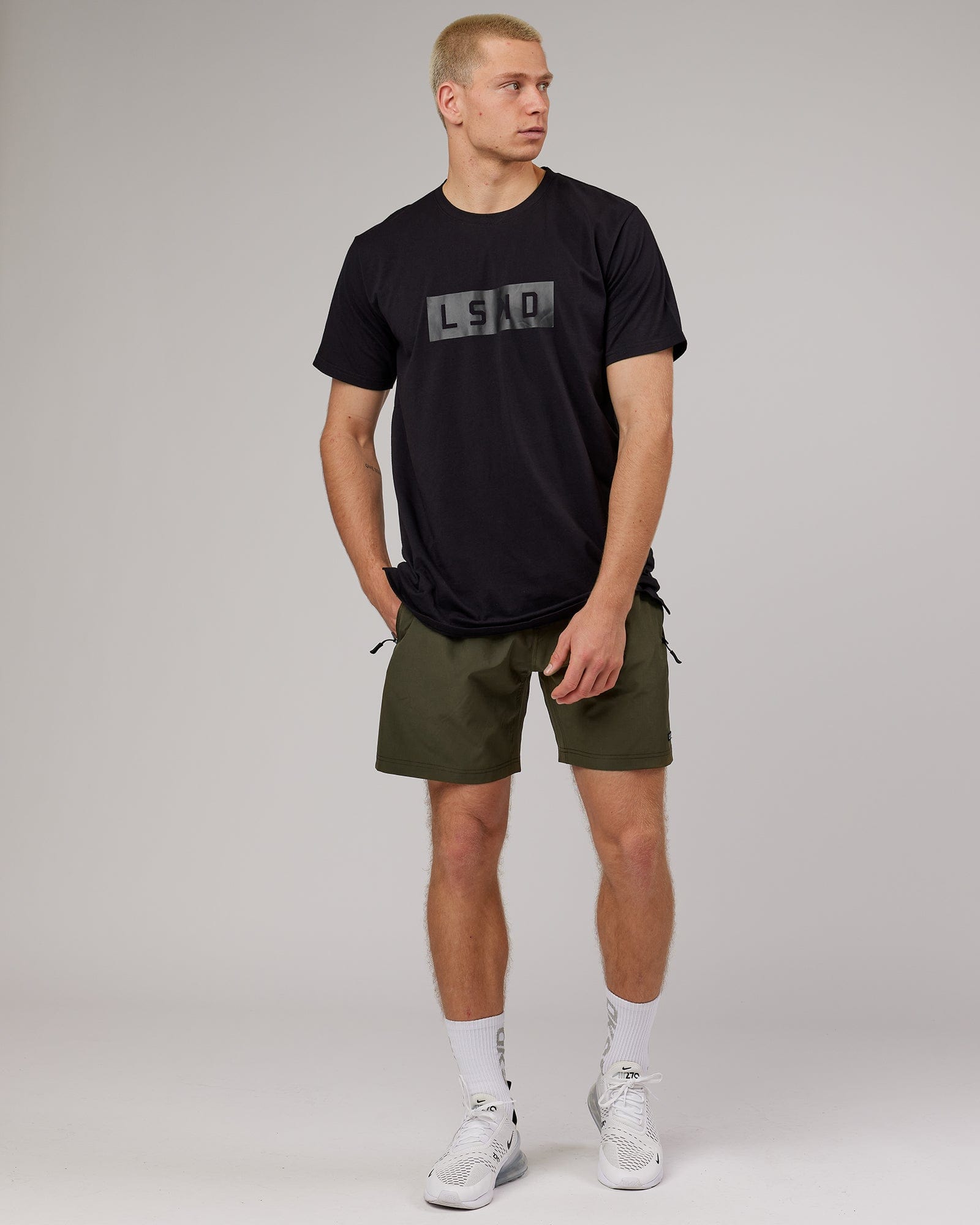 Model wearing Strength FLXDRY Performance Tee - Black-Black