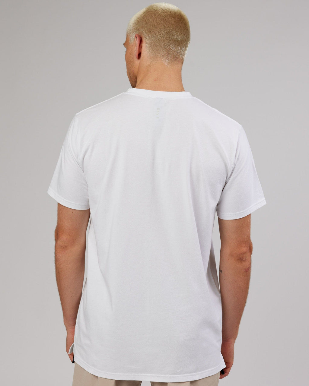 Model wearing Strength FLXDRY Performance Tee - White-Taupe