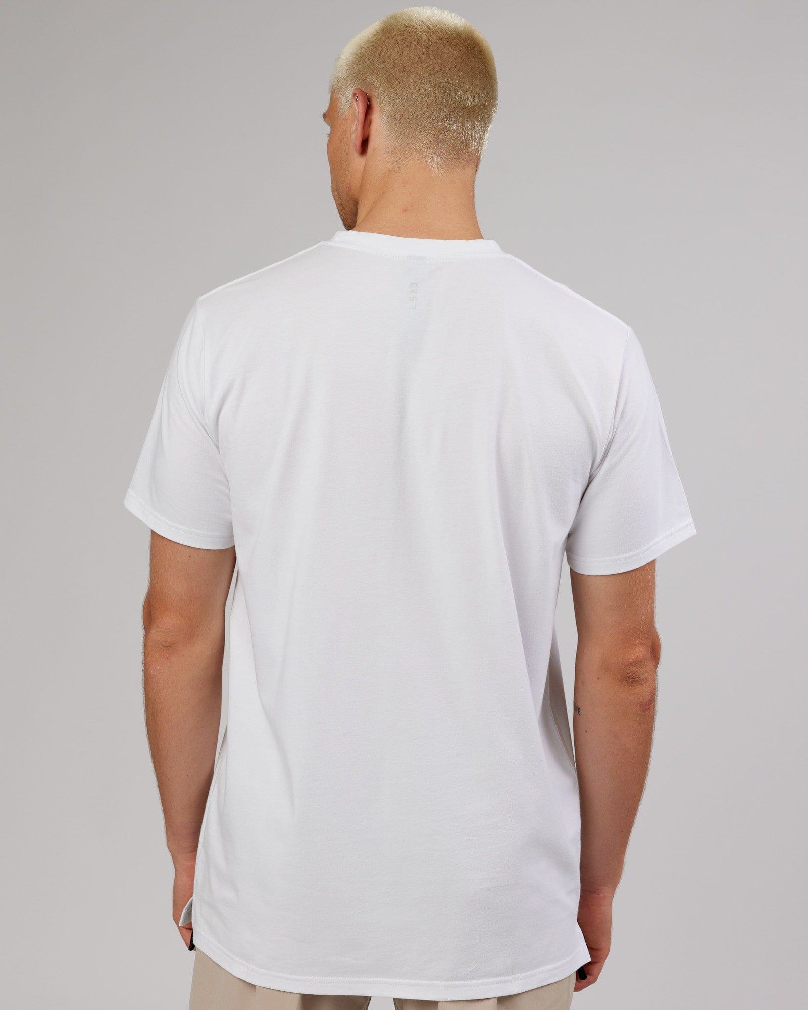 Model wearing Strength FLXDRY Performance Tee - White-Taupe