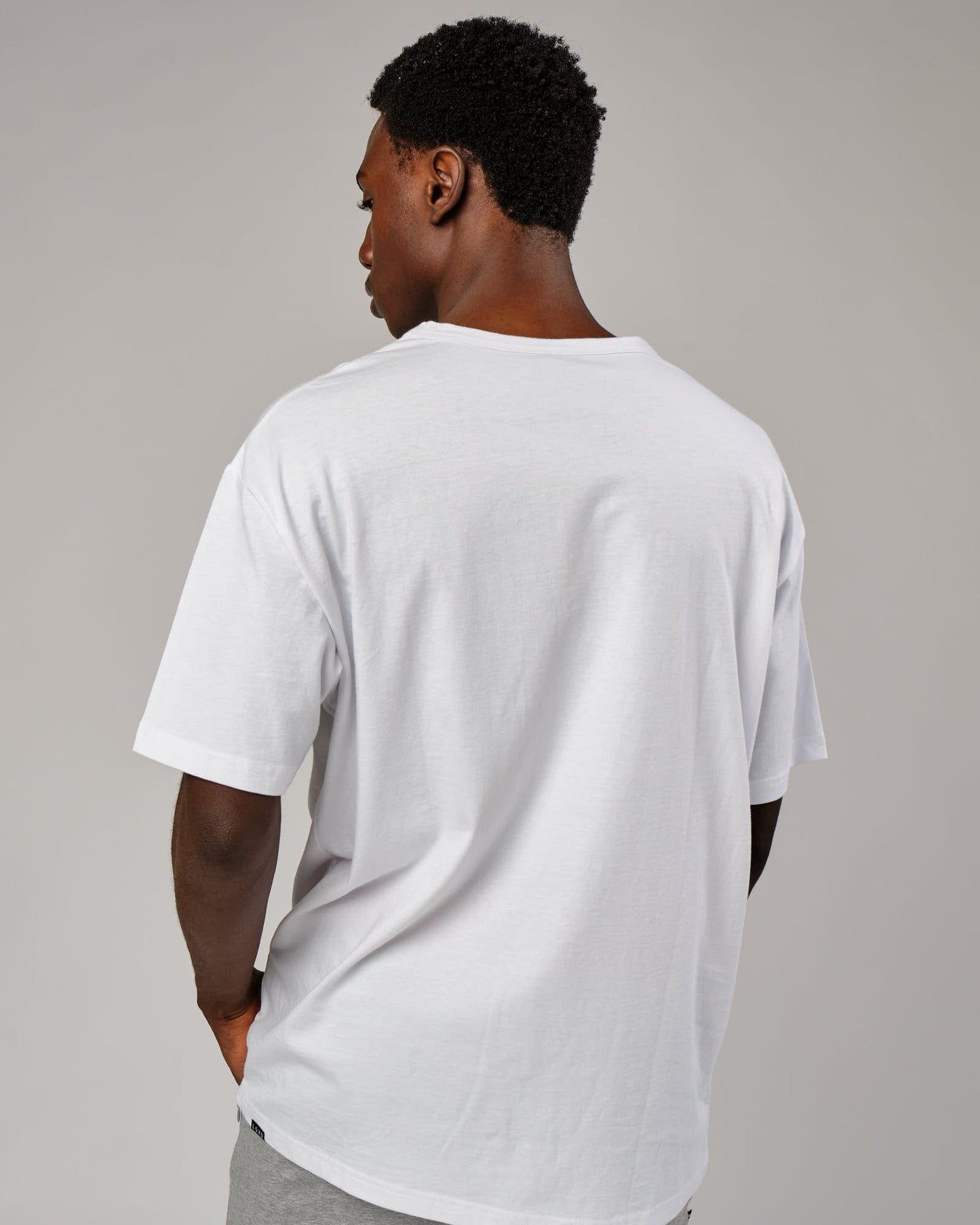 Model wearing Taylor Tee Oversize - White