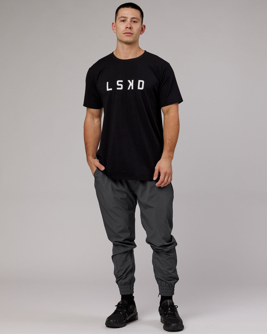 Model wearing Warm Up Zip Cuff Performance Jogger - Asphalt