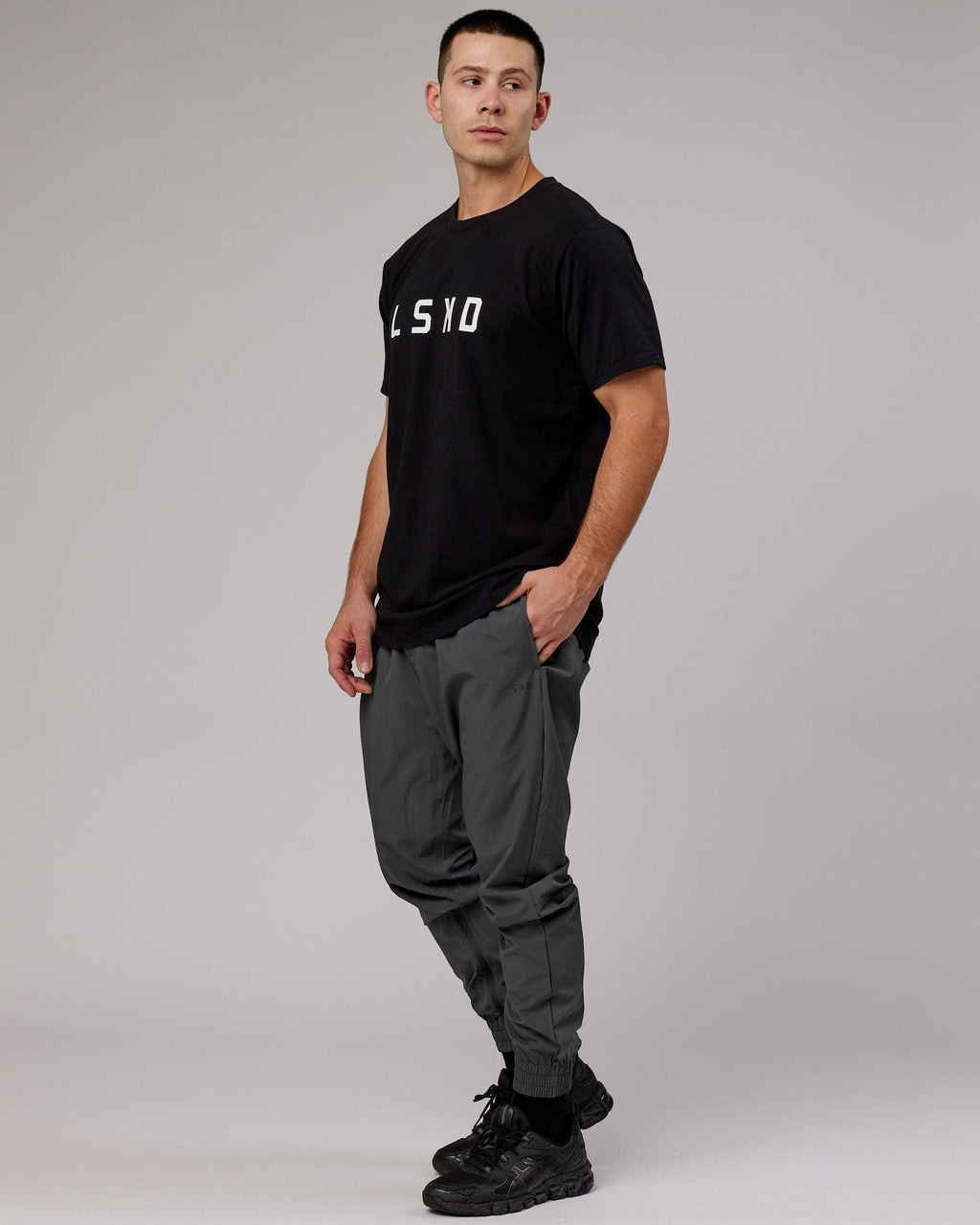 Model wearing Warm Up Zip Cuff Performance Jogger - Asphalt