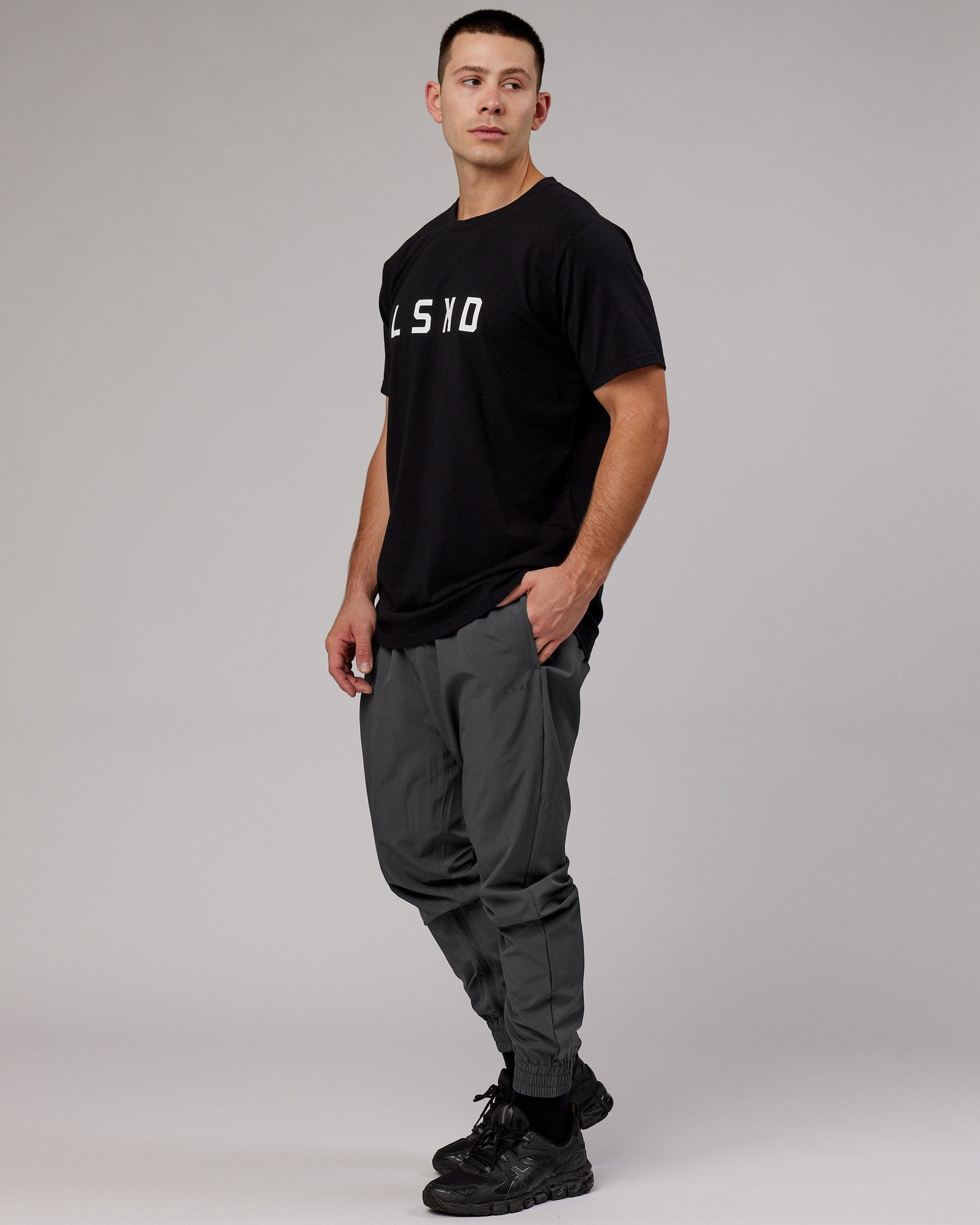 Model wearing Warm Up Zip Cuff Performance Jogger - Asphalt