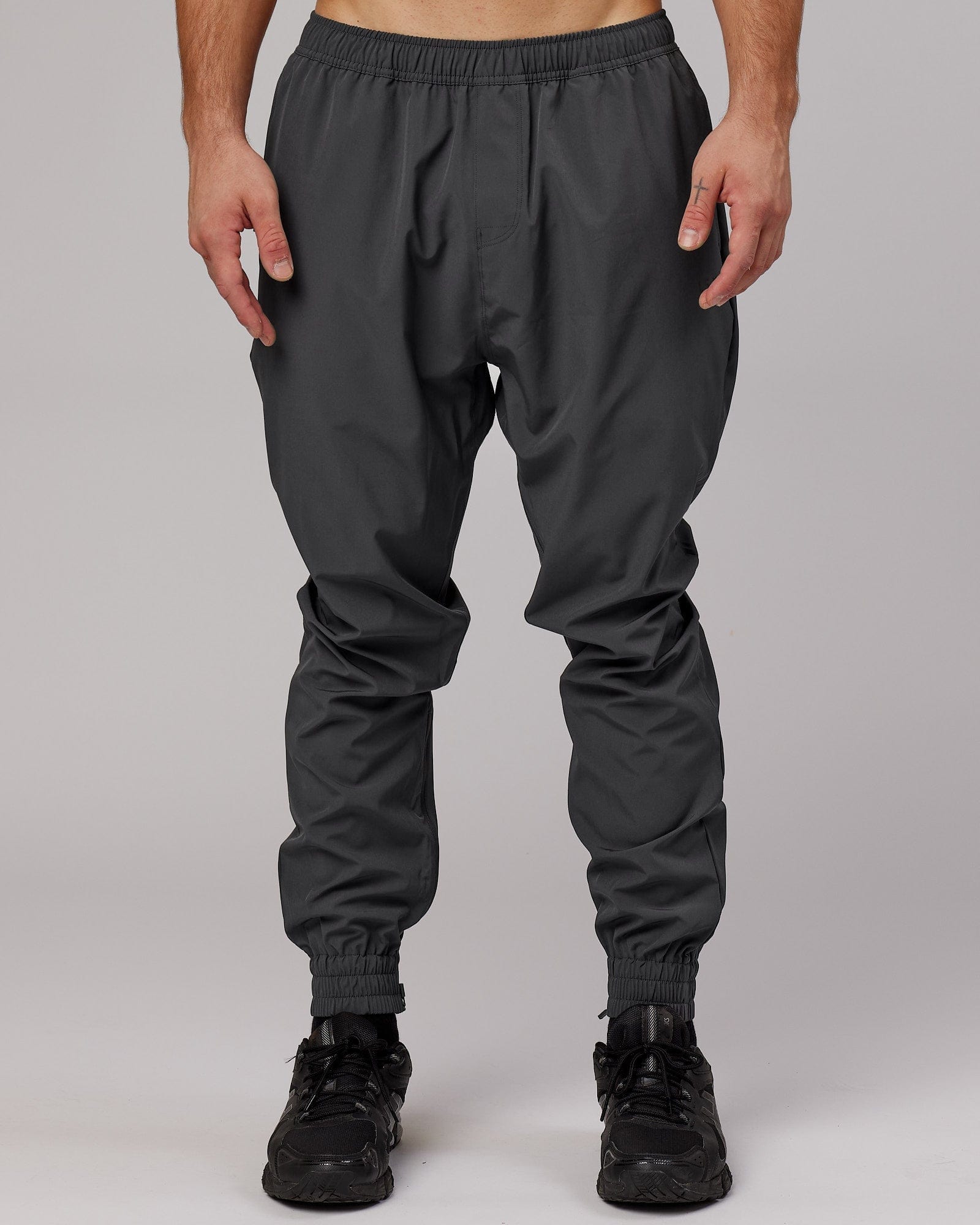 Model wearing Warm Up Zip Cuff Performance Jogger - Asphalt