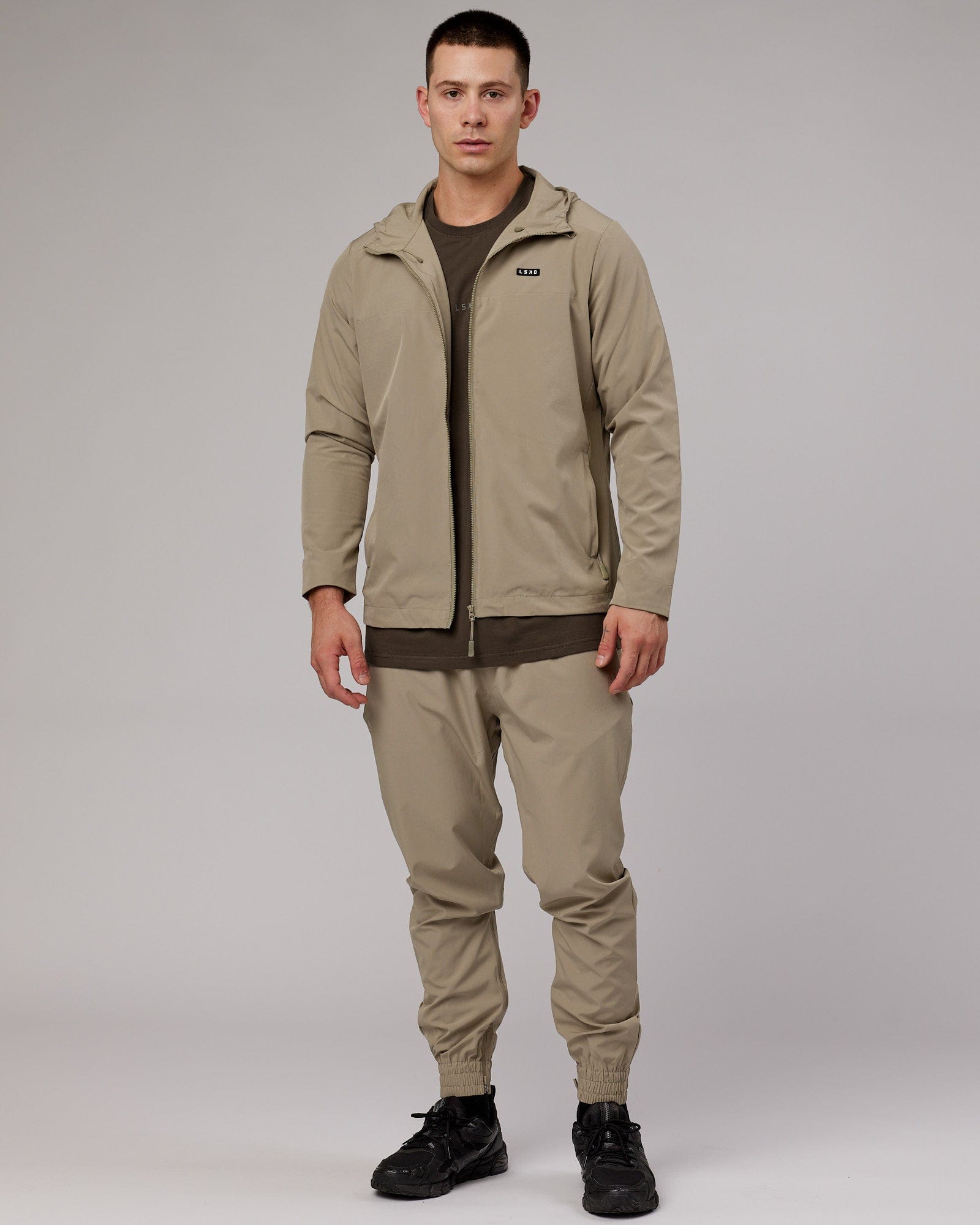 Model wearing Warm Up Zip Cuff Performance Jogger - Laurel Oak