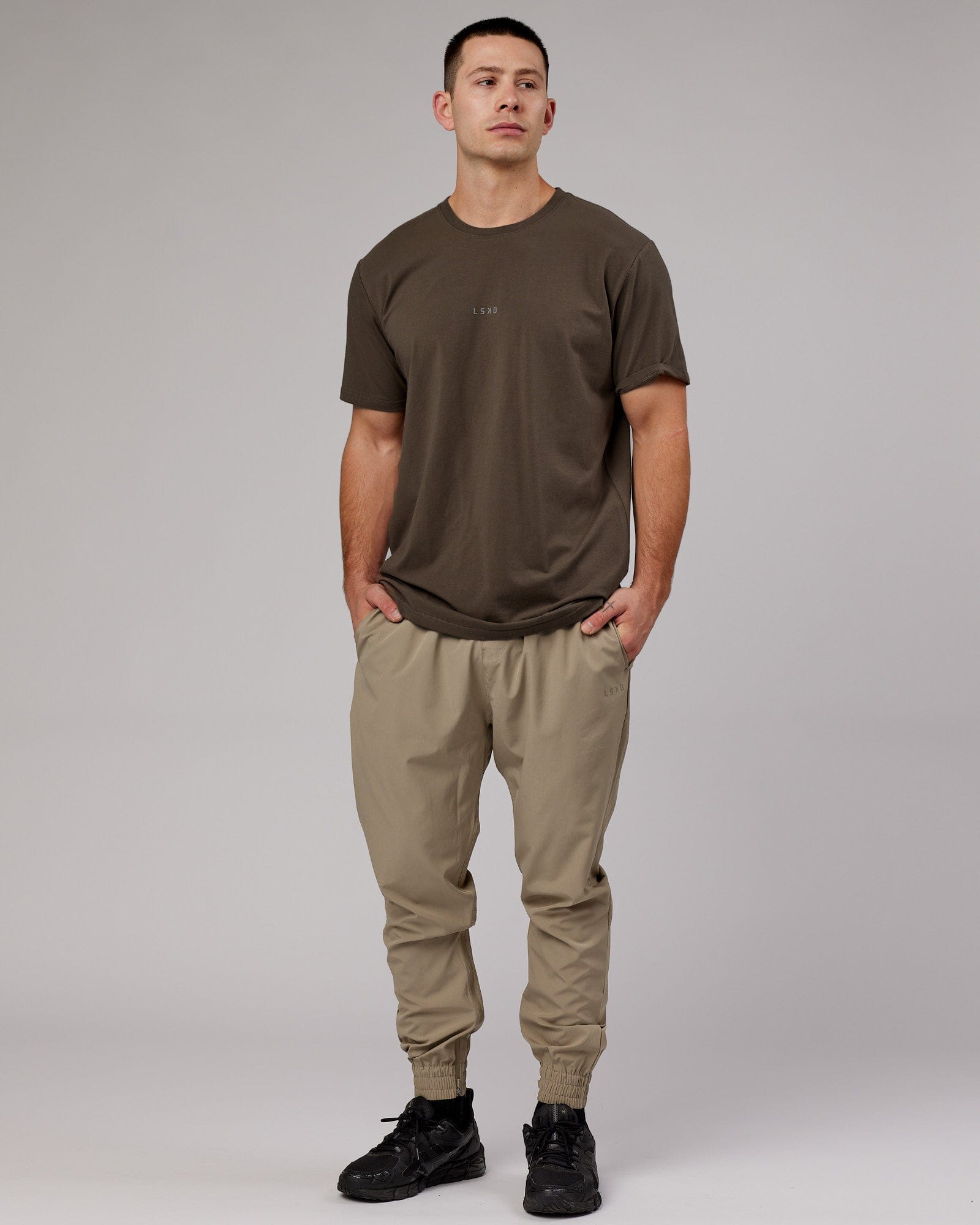 Model wearing Warm Up Zip Cuff Performance Jogger - Laurel Oak