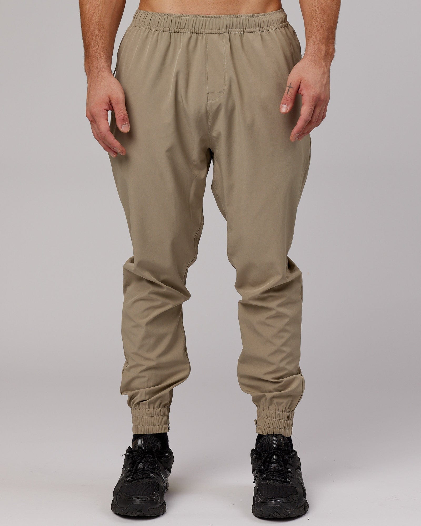 Model wearing Warm Up Zip Cuff Performance Jogger - Laurel Oak