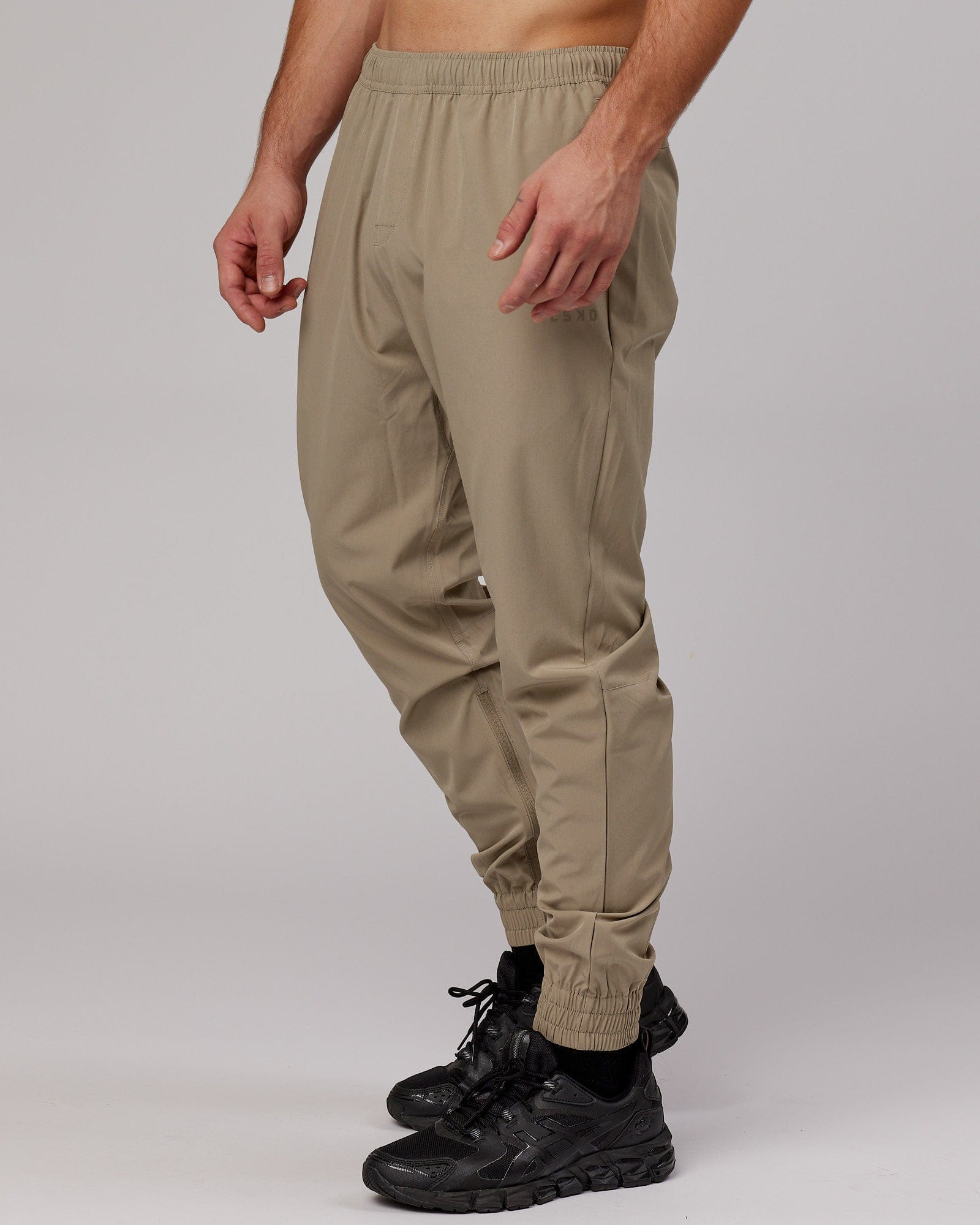 Model wearing Warm Up Zip Cuff Performance Jogger - Laurel Oak