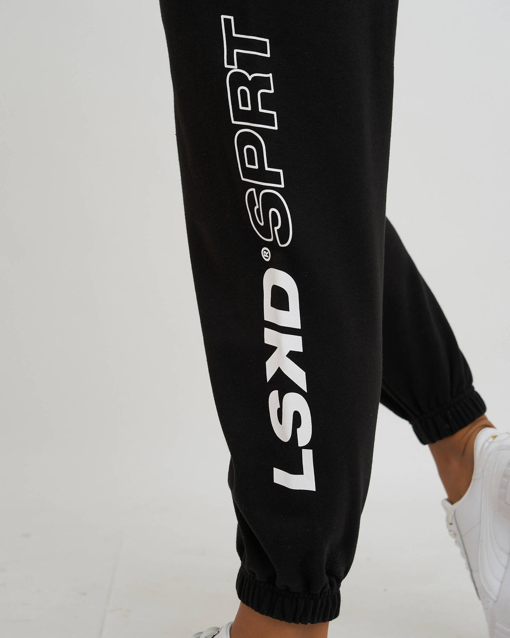Model wearing SPRT Trackpant - Black