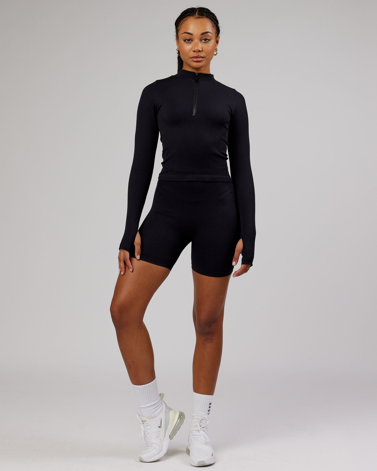 Model wearing Minimal 1/4 Zip LS Top - Black