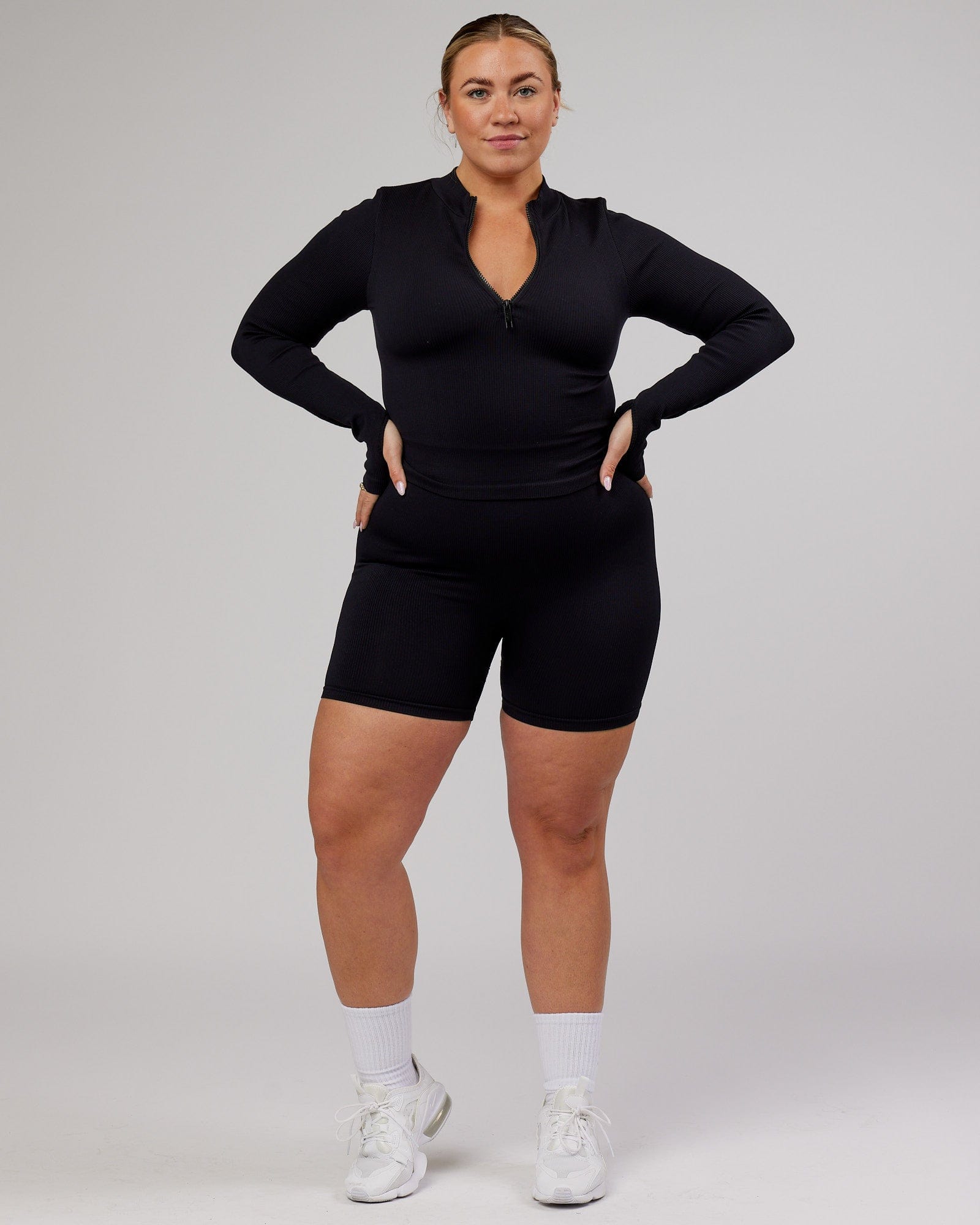 Model wearing Minimal 1/4 Zip LS Top - Black