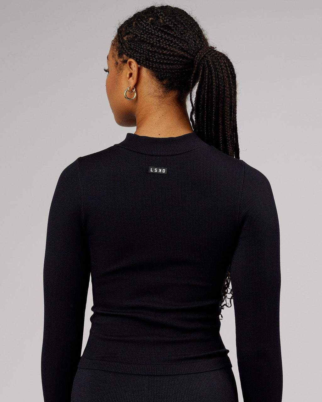 Model wearing Minimal 1/4 Zip LS Top - Black