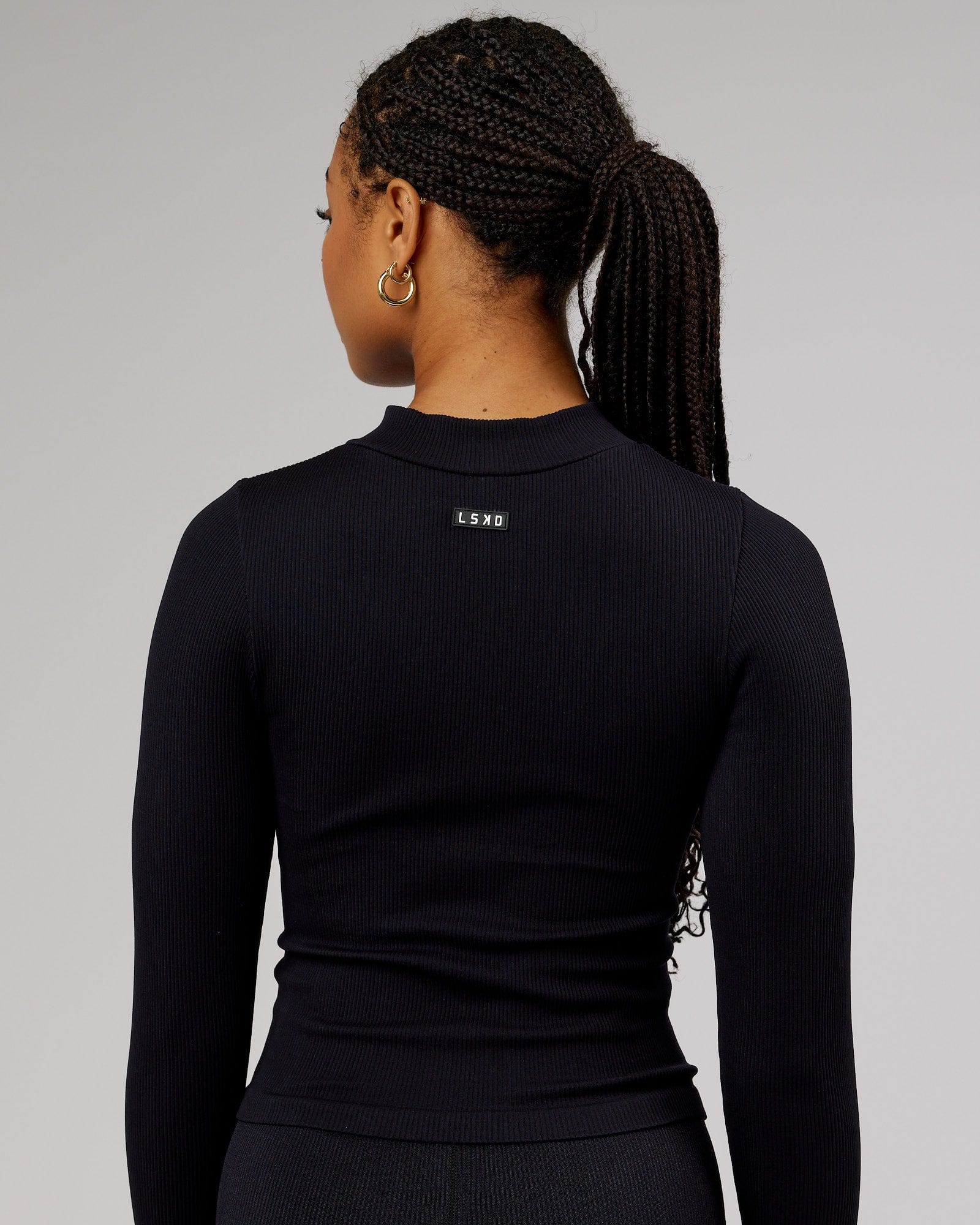 Model wearing Minimal 1/4 Zip LS Top - Black