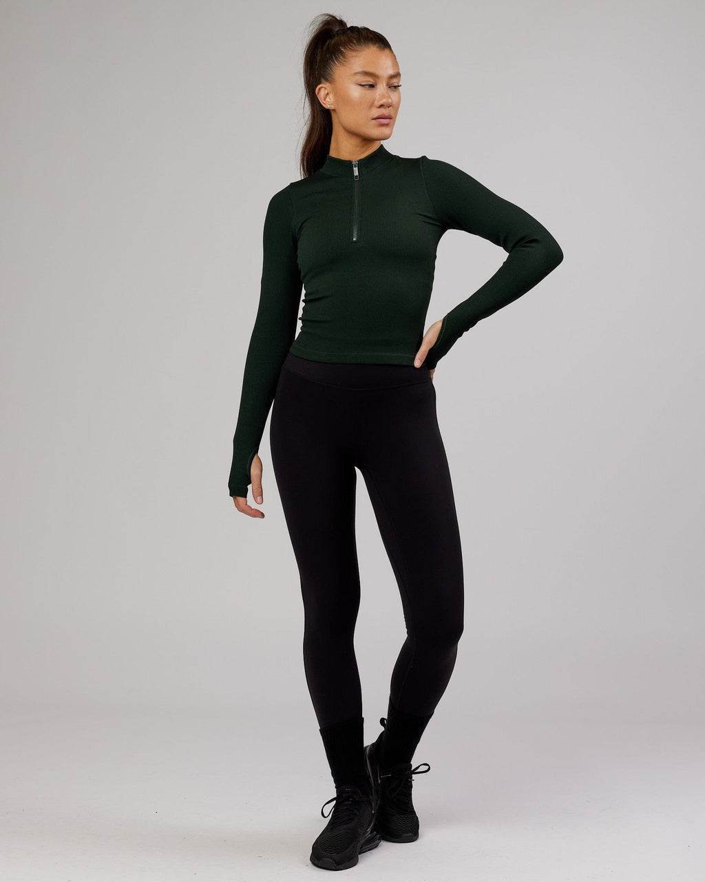 Model wearing Minimal 1/4 Zip LS Top - Dark Forest